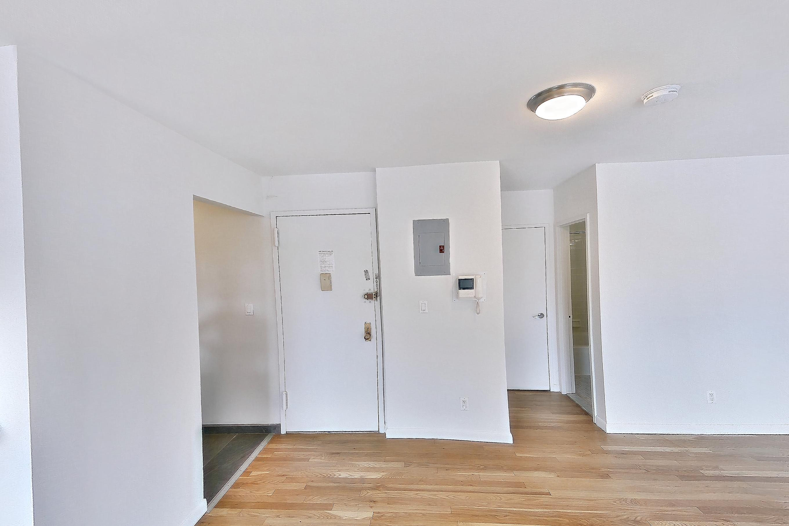 Living and sleeping with light wood-finish flooring and wood-finish flooring, Apartment 1201 at Bettina Equities