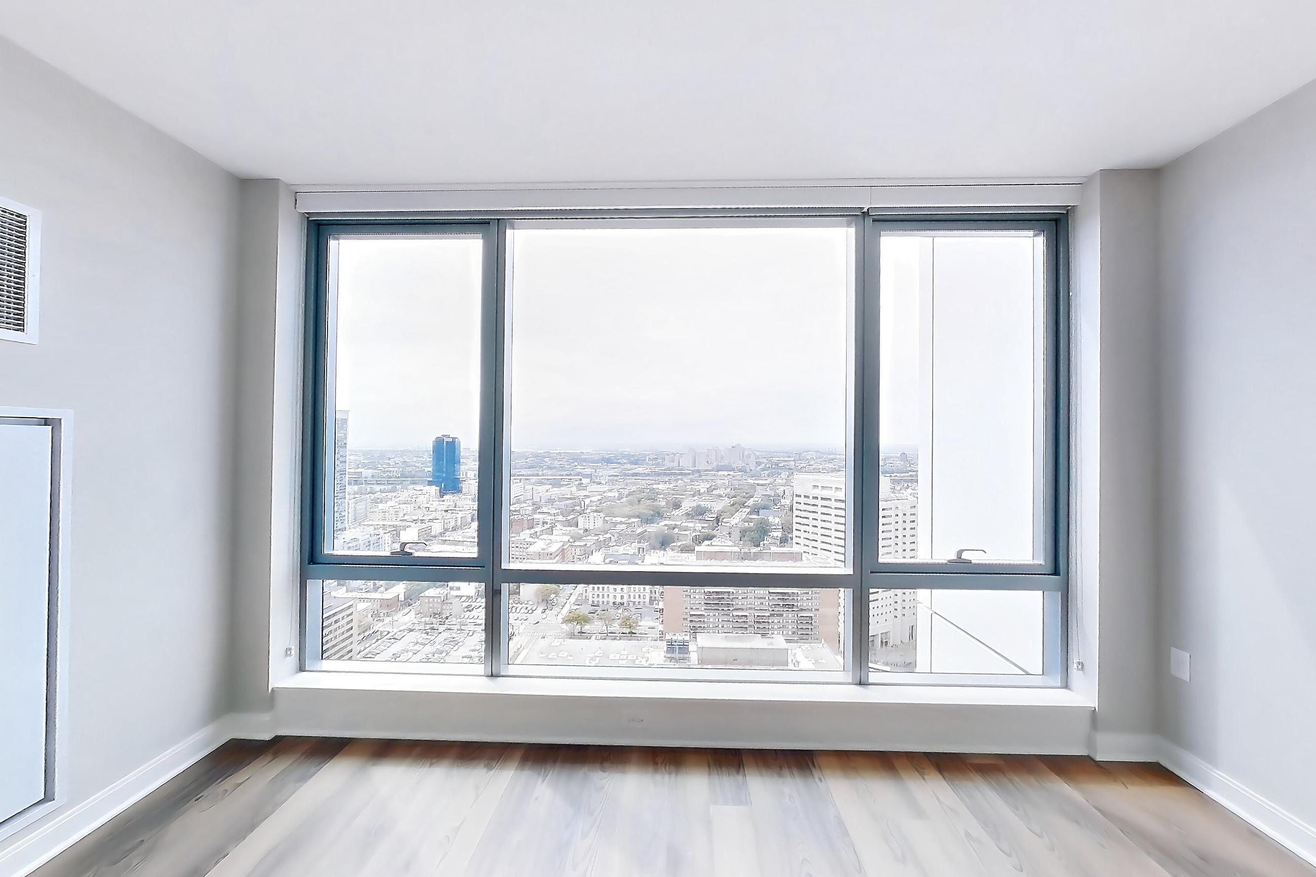 Living space with city view, Apartment H25-3616 at Haus25