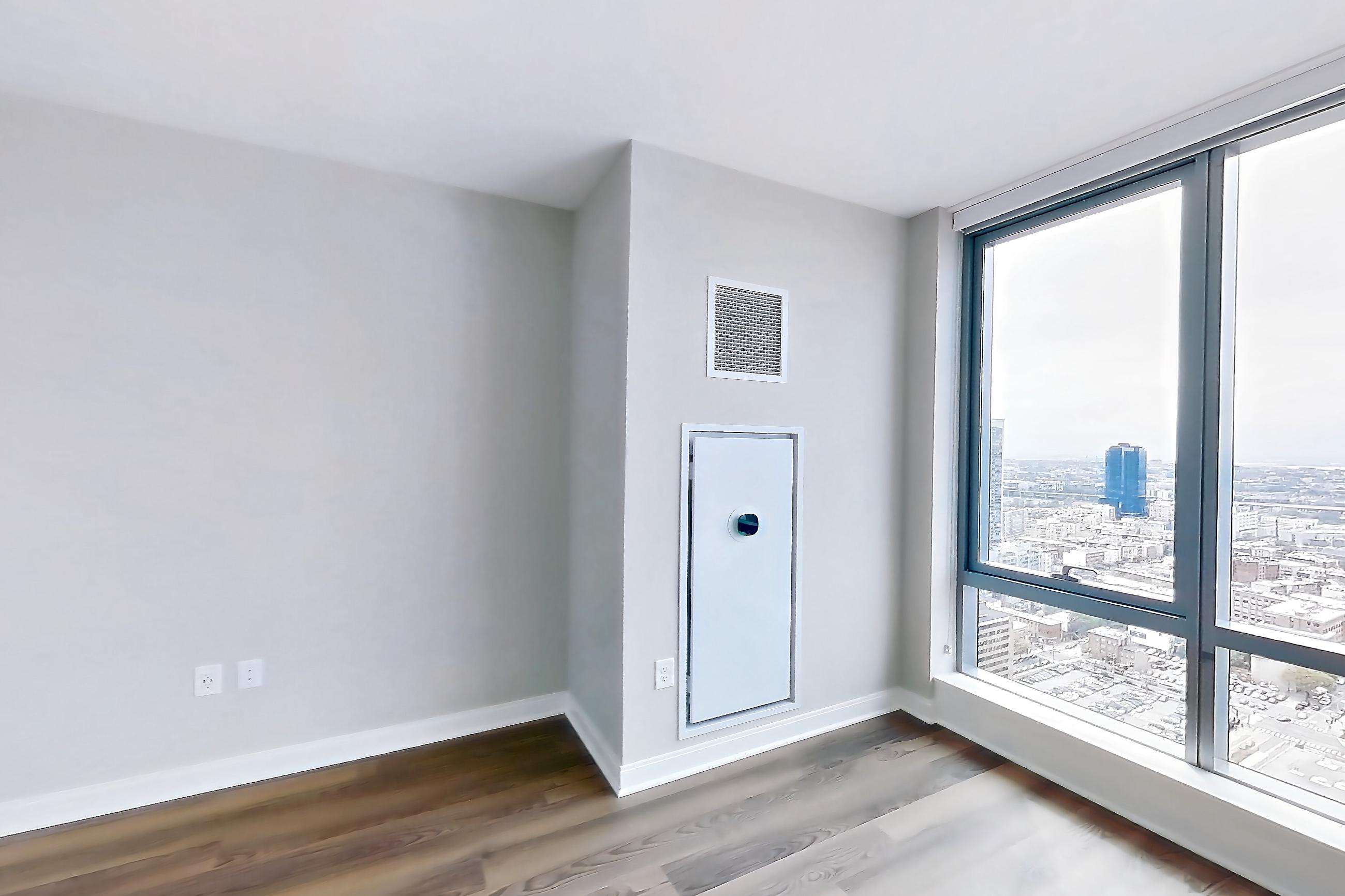 Living space with city view, Apartment H25-3616 at Haus25