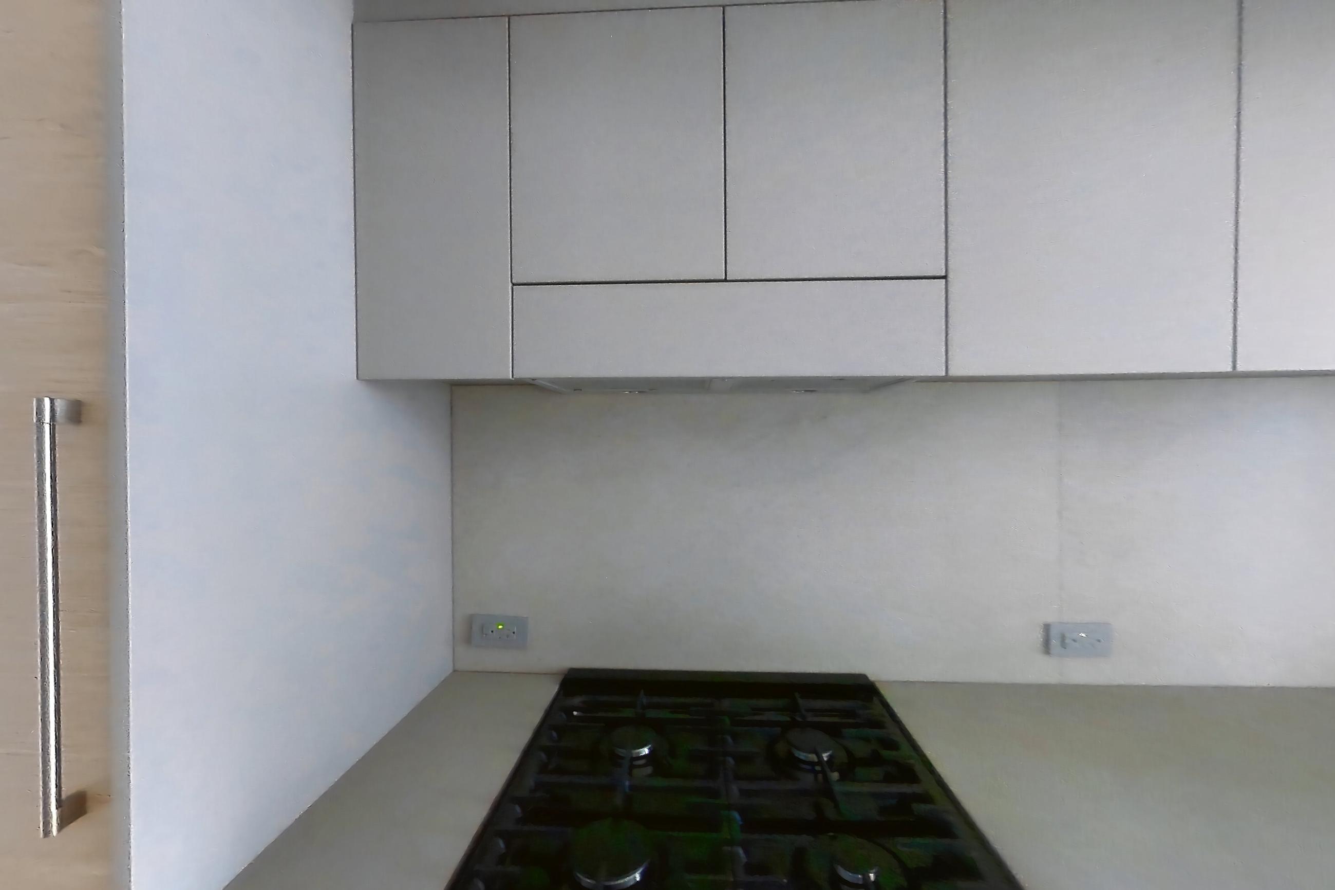 Kitchen with gas range, light wood-finish flooring, oven/range, and stainless steel appliances, Apartment 2-0824 at Eagle + West