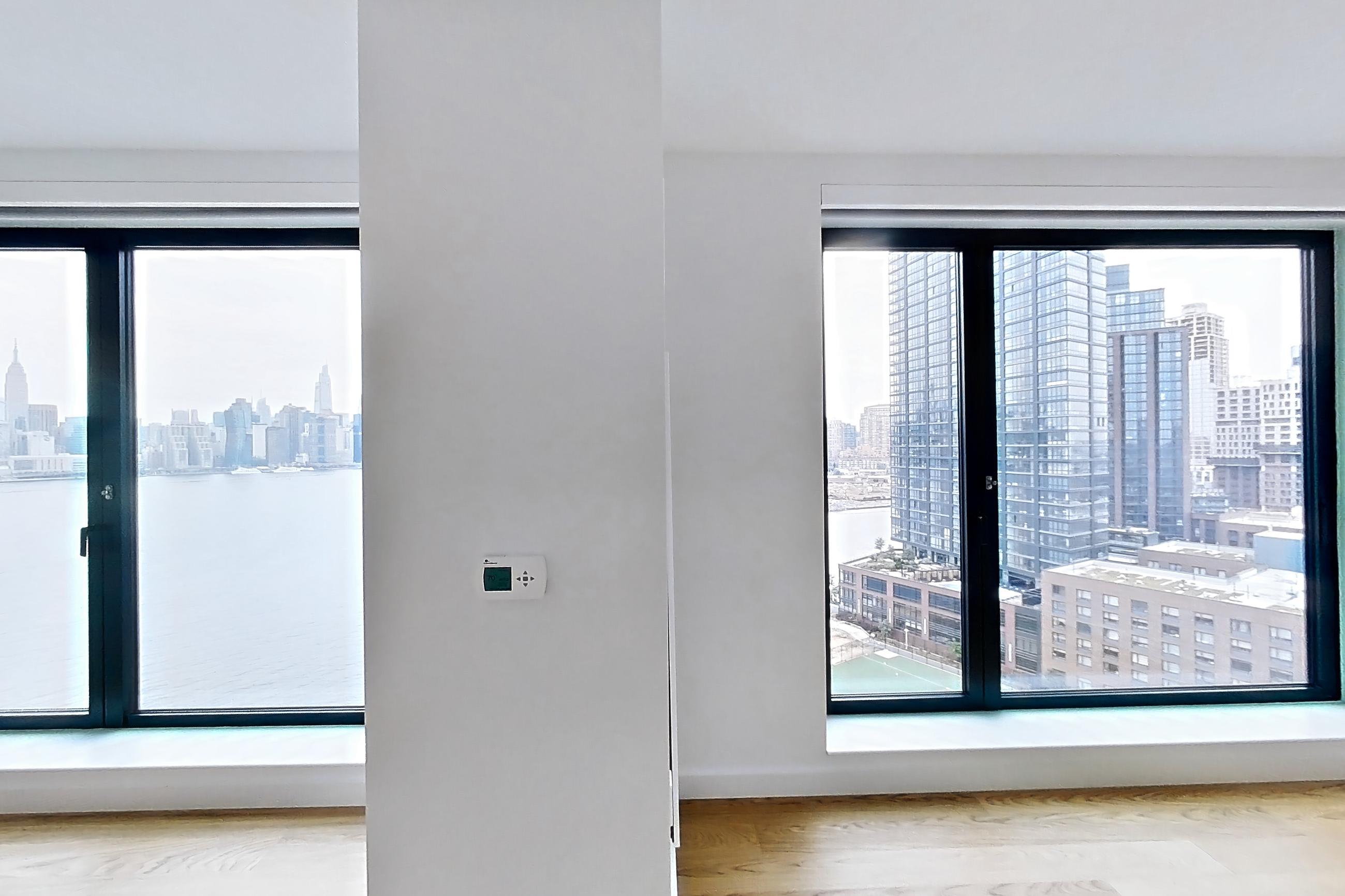 Living space with city view, Apartment 2-1523 at Eagle + West
