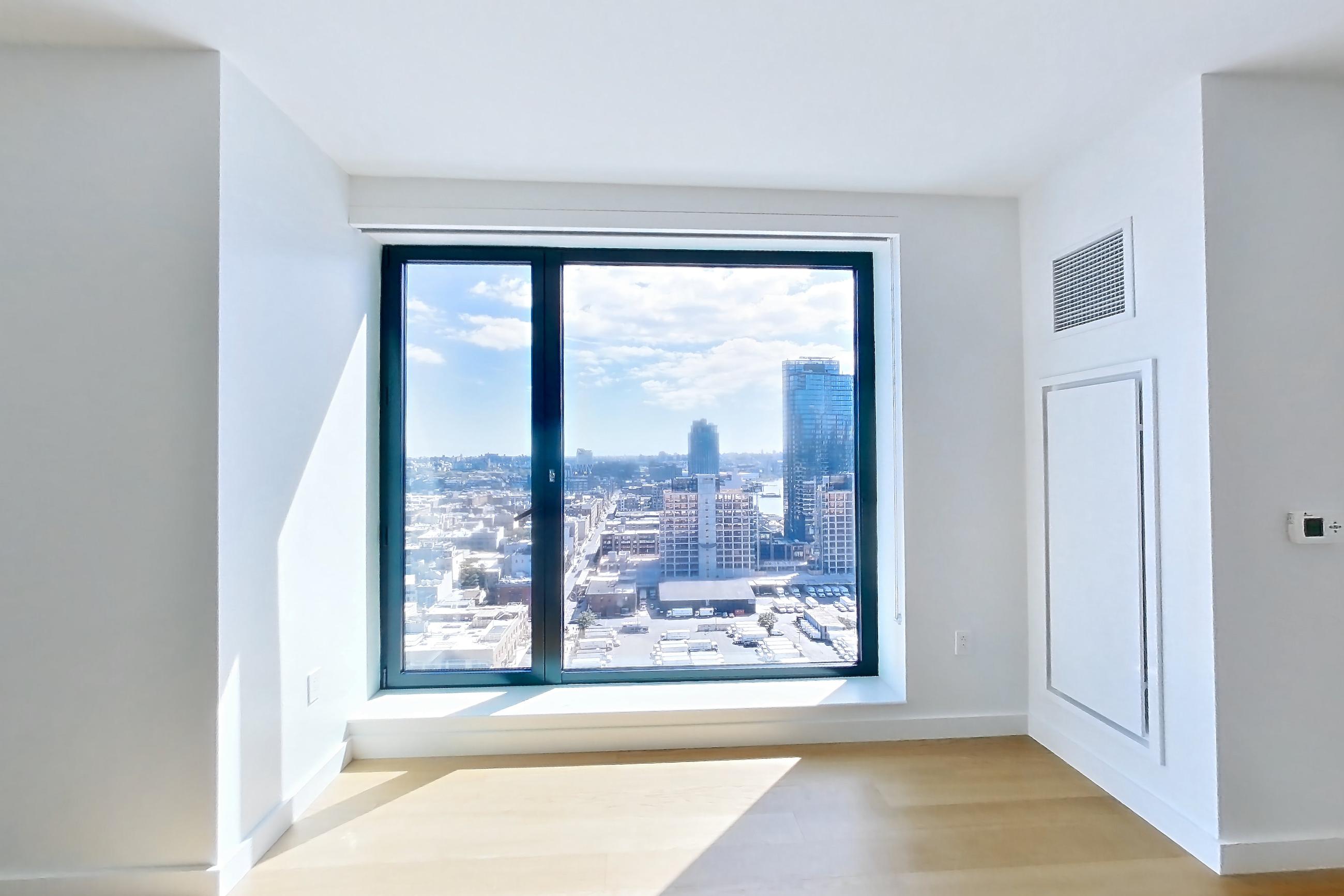 Living space with city view, Apartment 2337 at Eagle + West