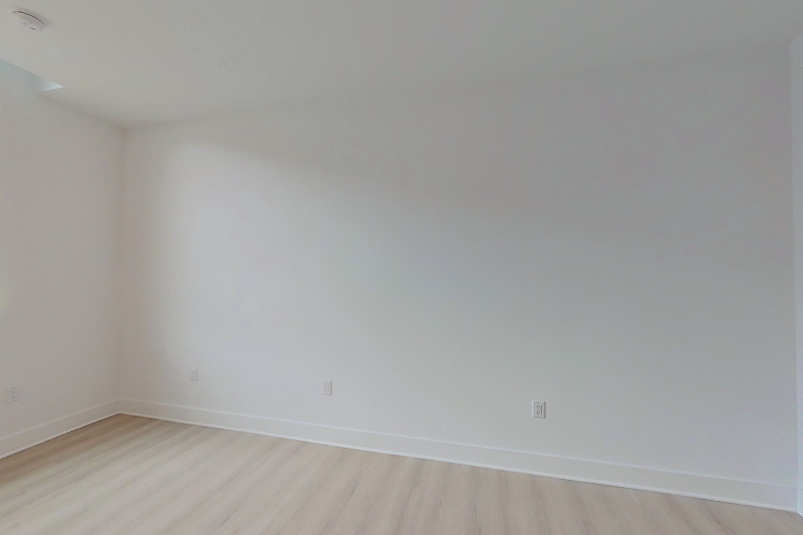Kitchen with light wood-finish flooring, Apartment 111 at SoNYa