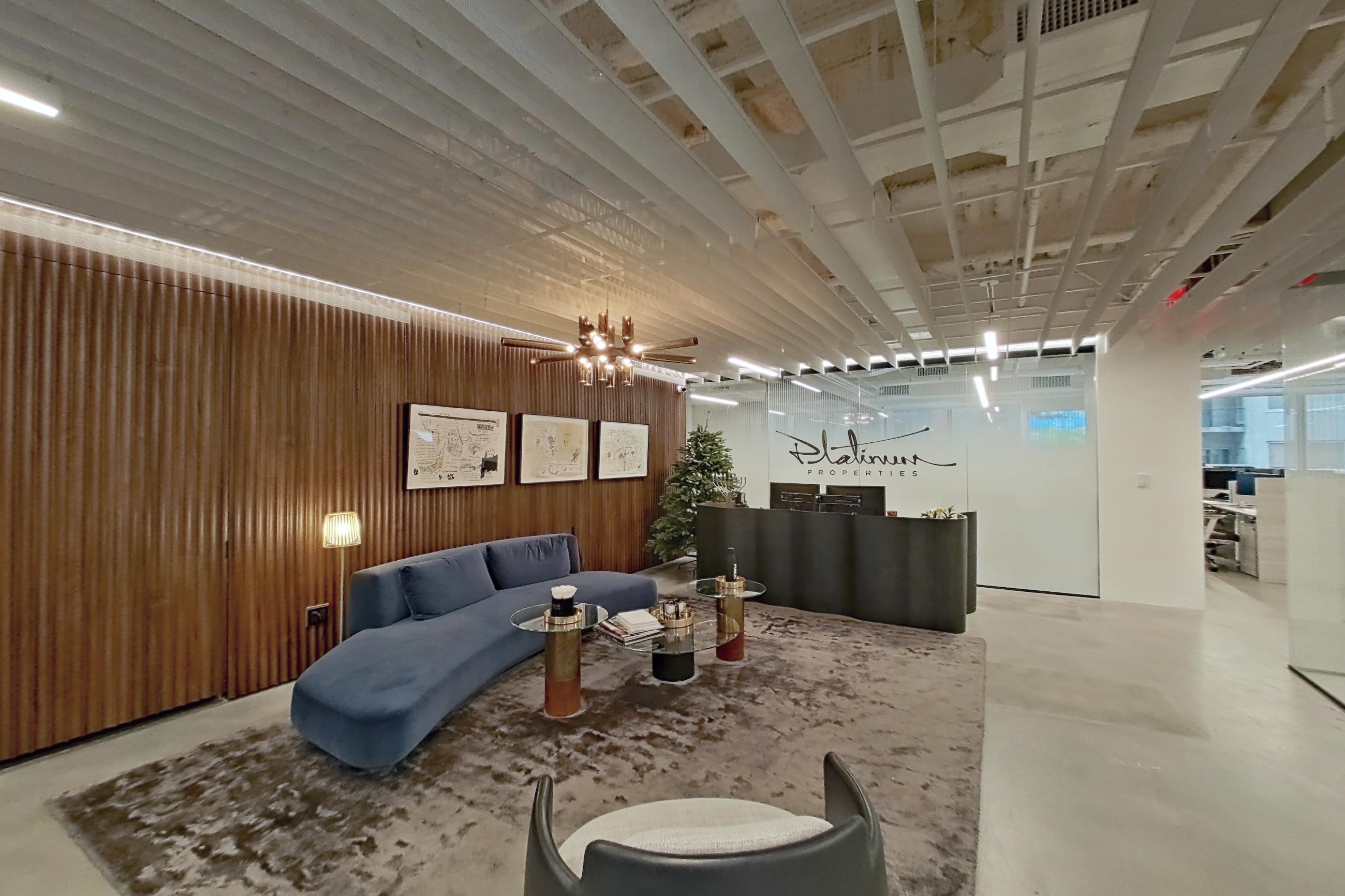 Living room corner 2 with polished concrete flooring, Apartment 202 at Platinum Properties