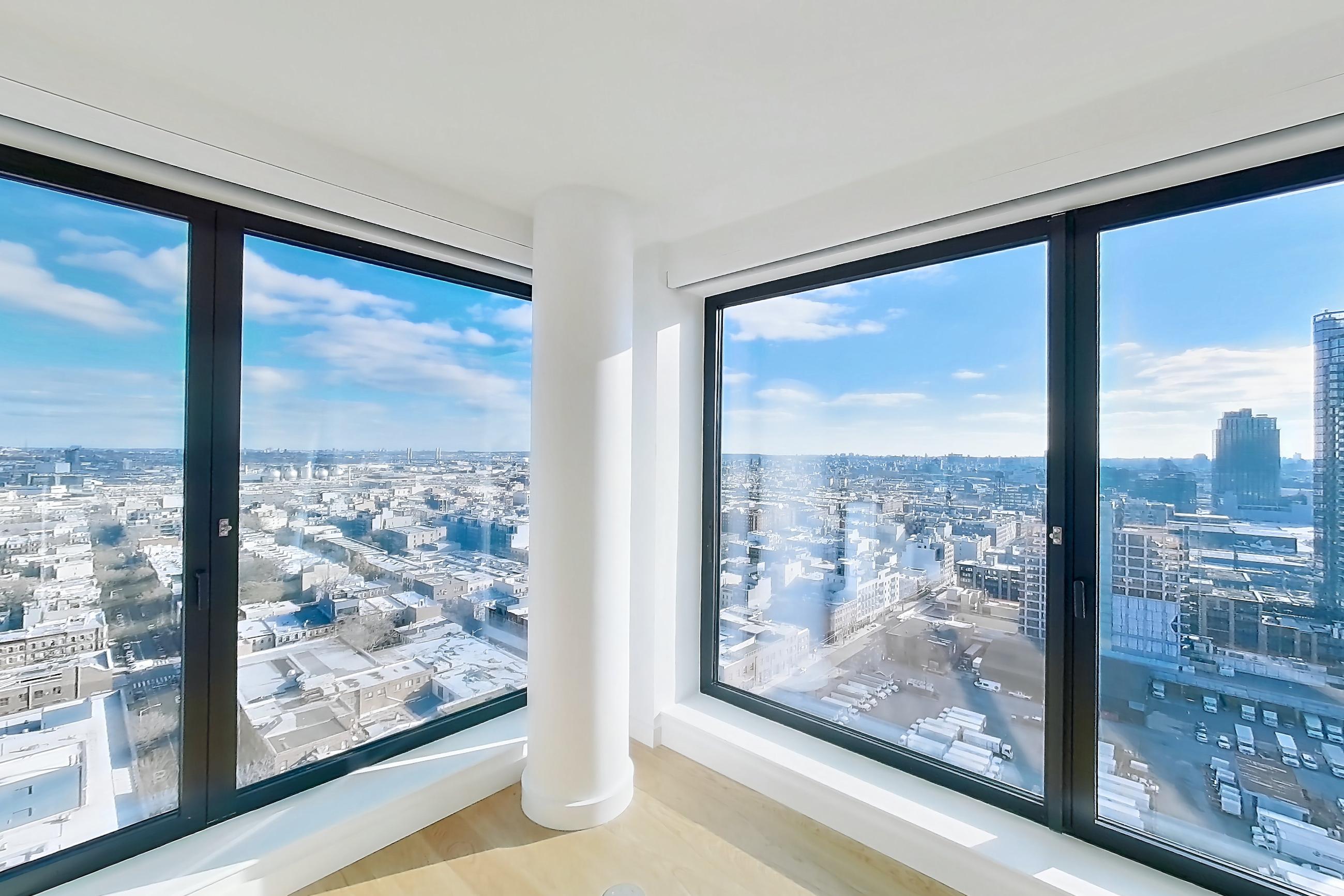 Living room with city view, Apartment 1-2508 at Eagle + West