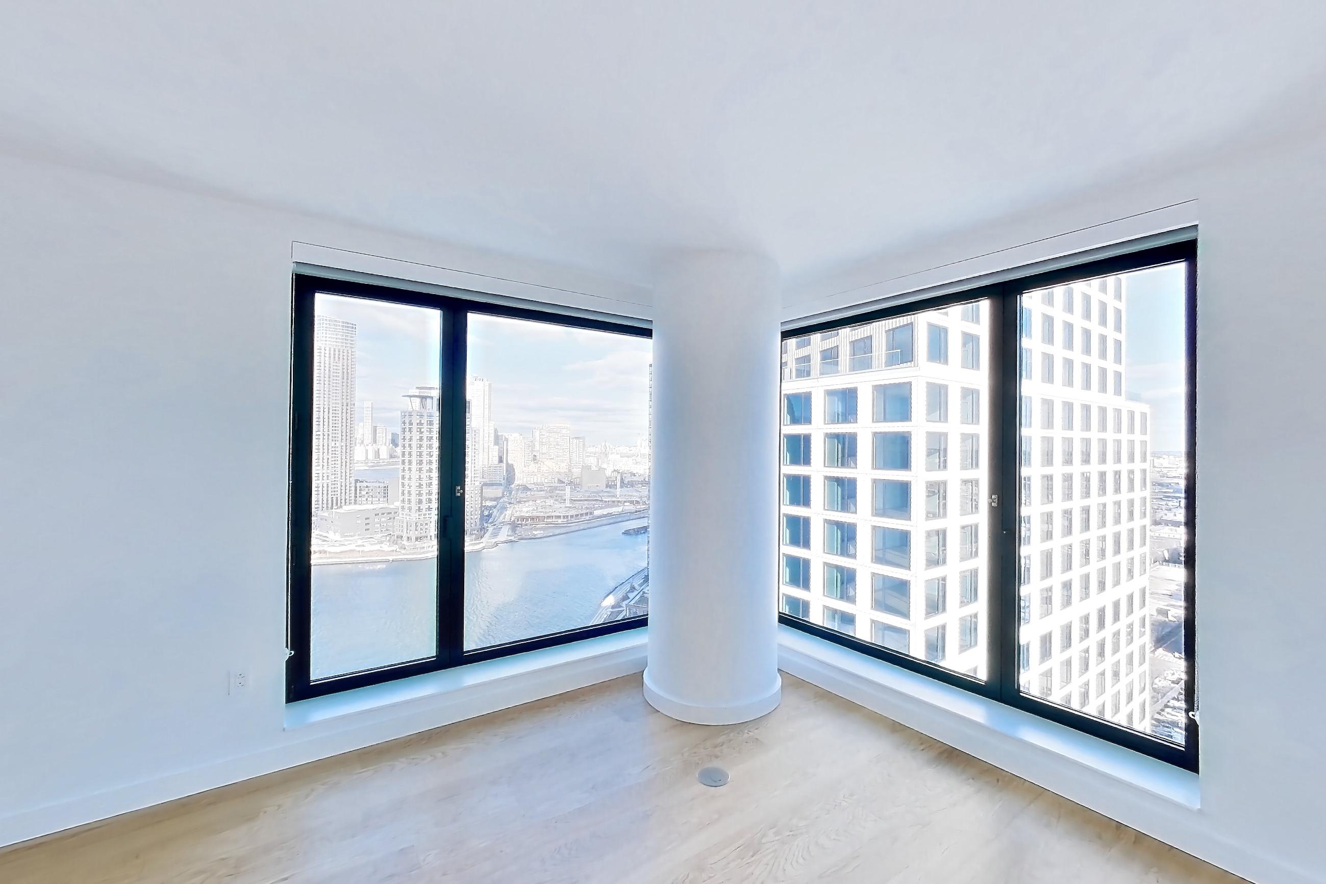 Living room with city view, Apartment 1-2507 at Eagle + West