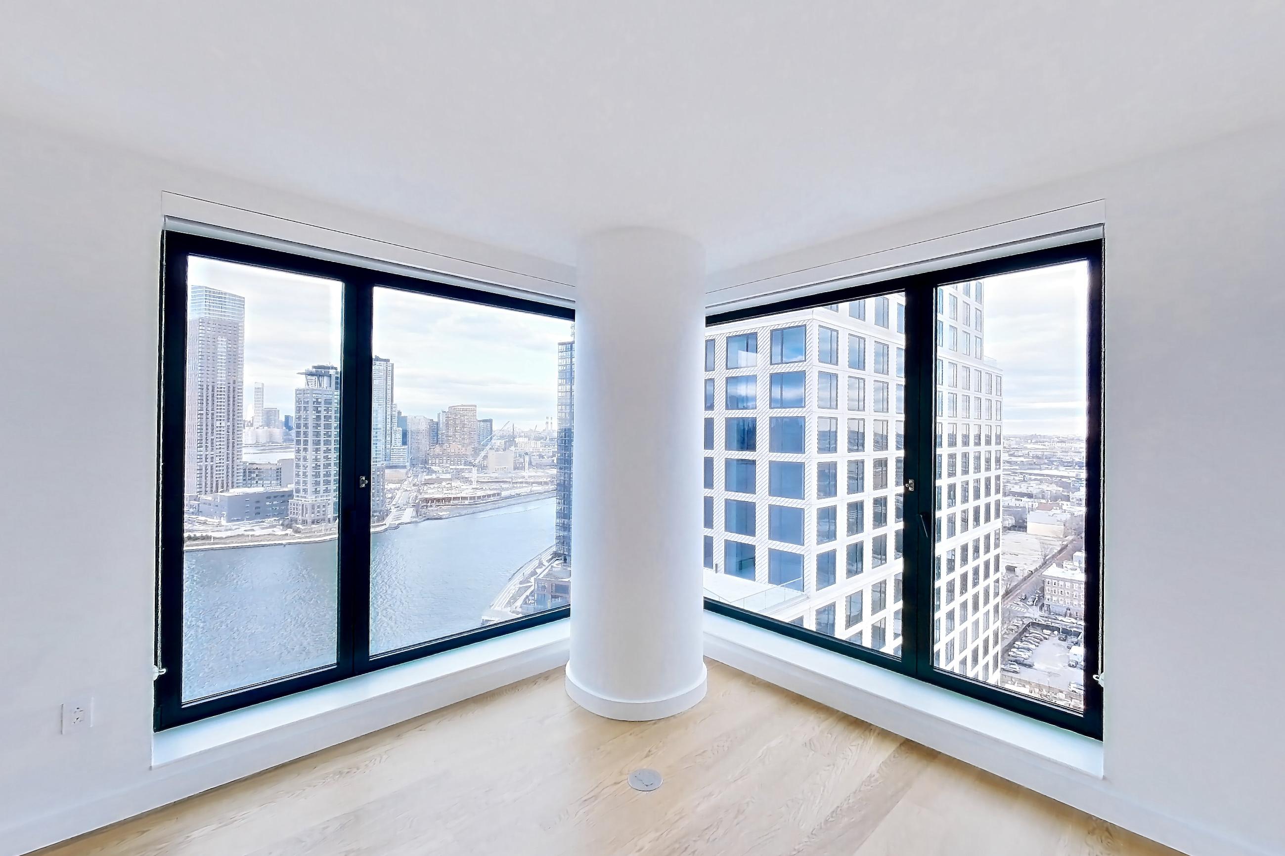 Living space with city view, Apartment 1-2407 at Eagle + West