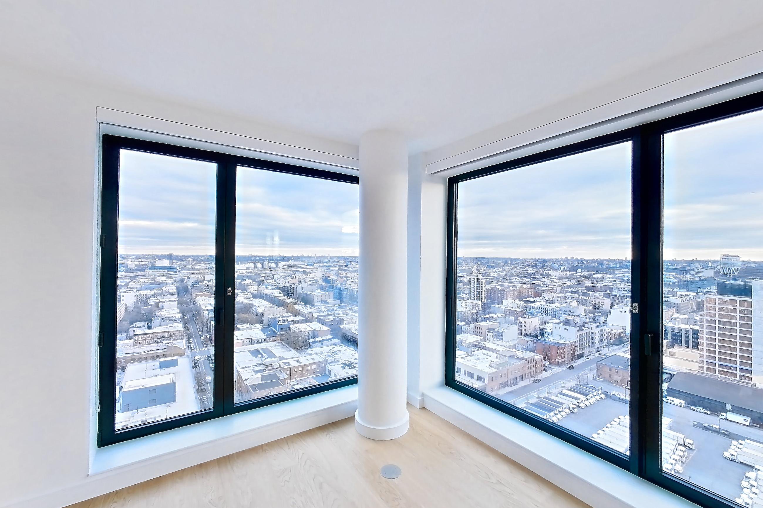 Living room with city view, Apartment 1-2308 at Eagle + West