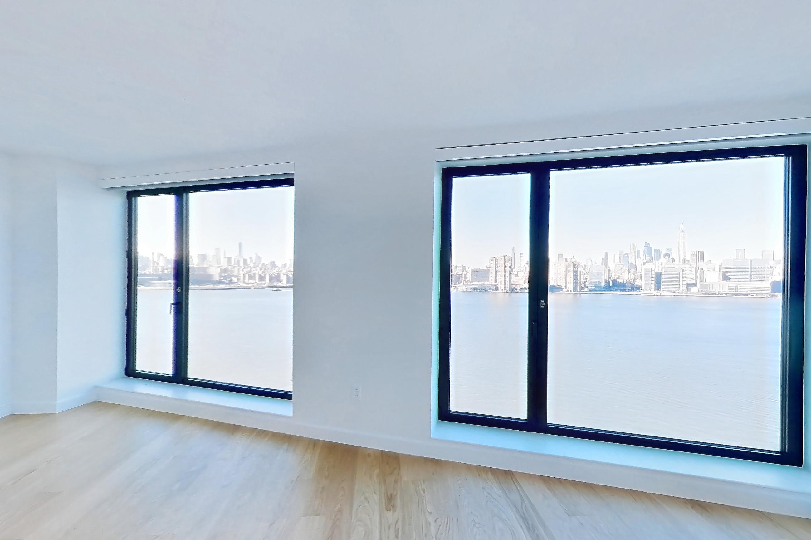 Living room, Apartment 1-2204 at Eagle + West