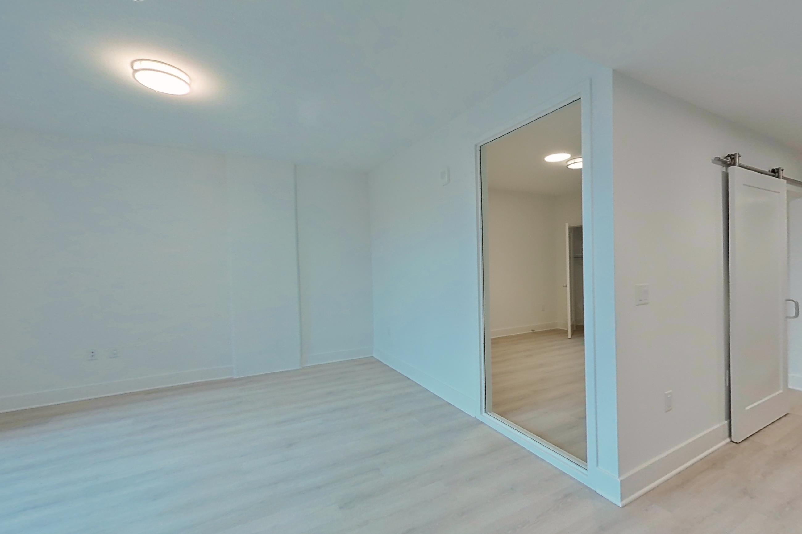 Kitchen with light wood-finish flooring, Apartment 420 at SoNYa