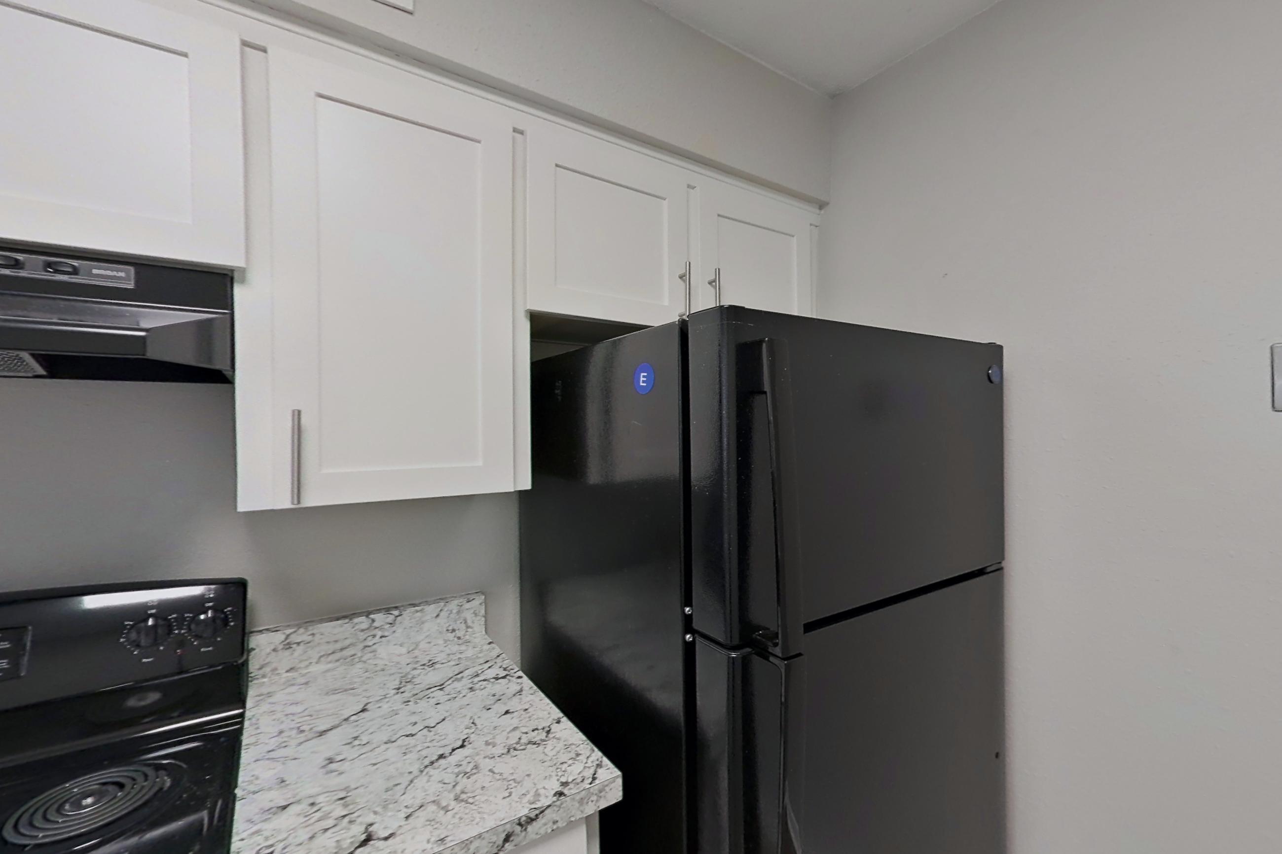 Kitchen in a 2x2 B Elite floor plan apartment, representative of Apartment 1406D at The Life at Legacy Fountains
