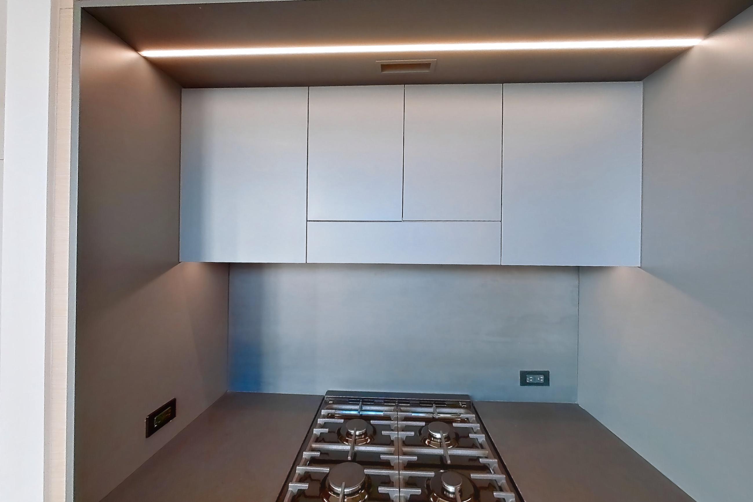 Kitchen with gas range and light wood-finish flooring, Apartment 1-1002 at Cortland Rosslyn