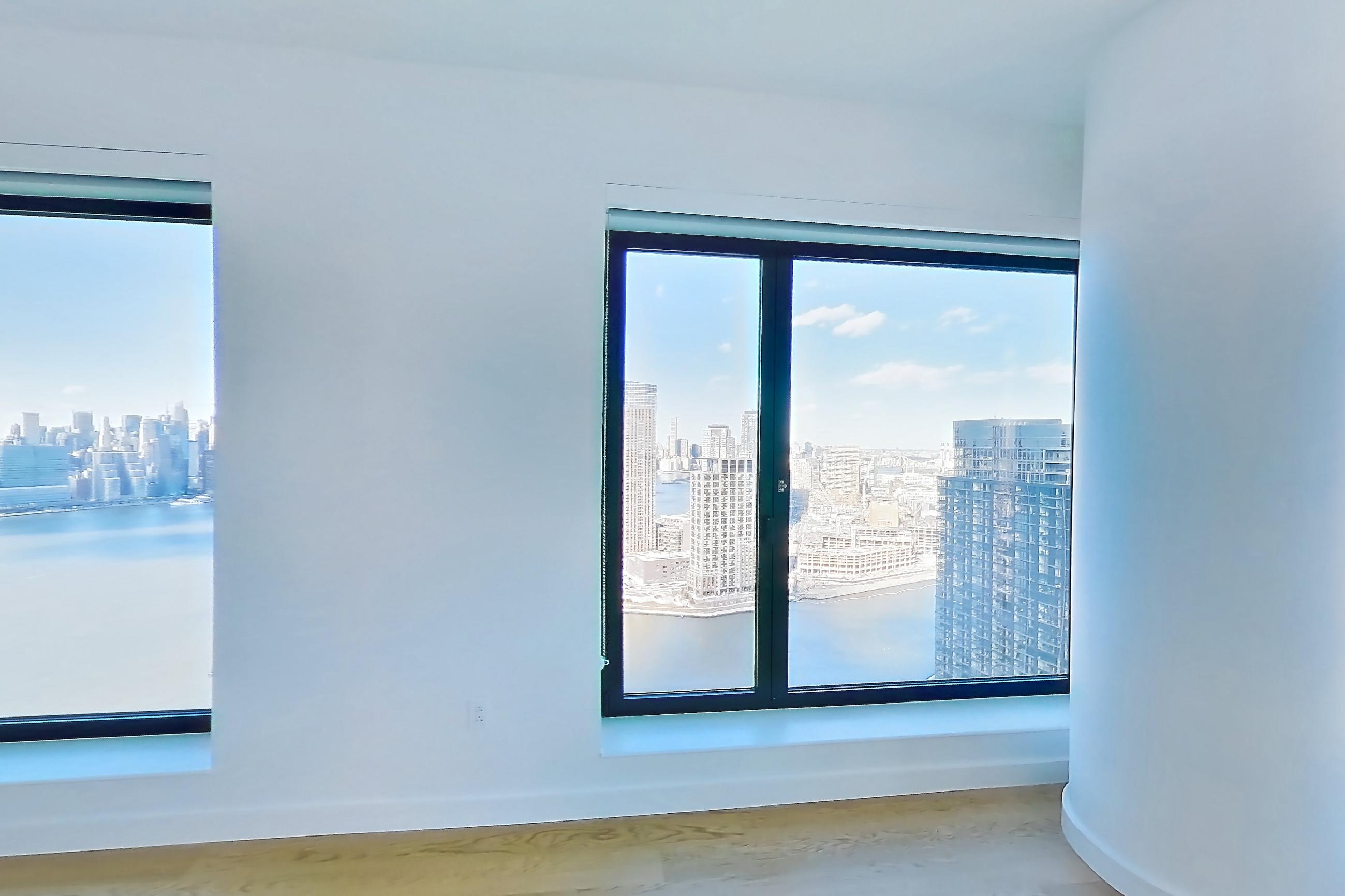 Living room in Apartment 1-ph1e at Eagle + West, 2AN floor plan
