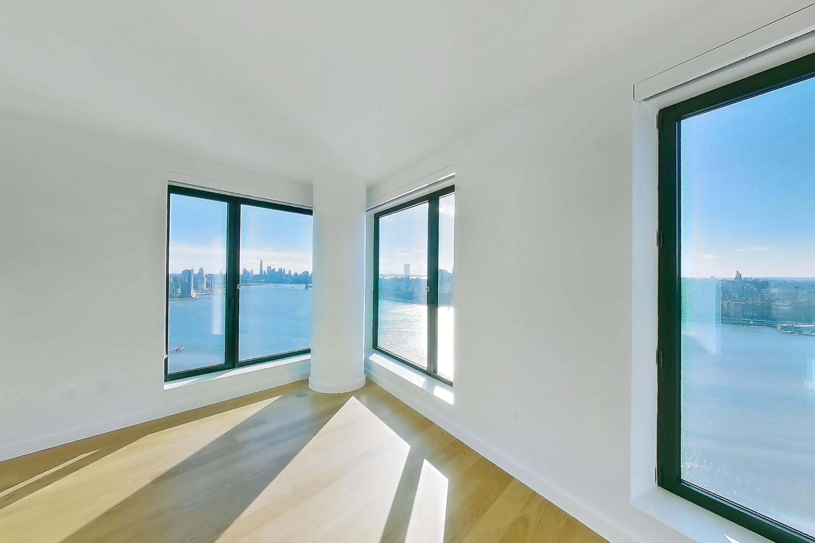 Living room in Apartment 1-ph2b at Eagle + West, 1BH floor plan