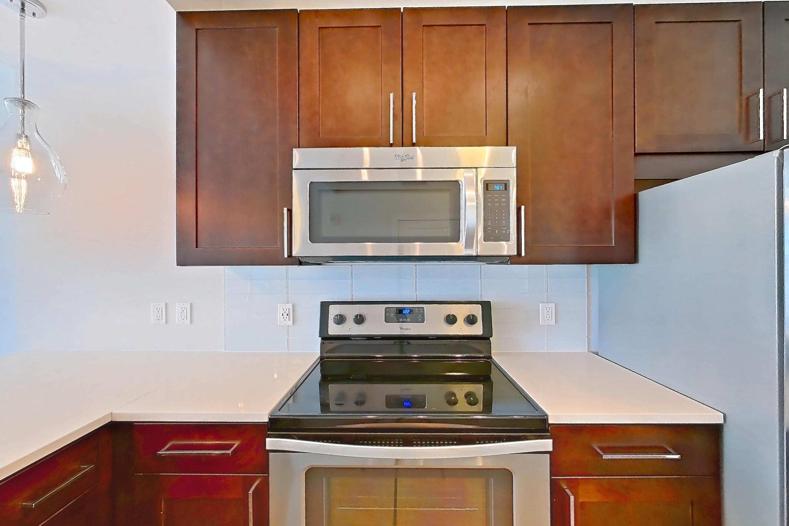 Kitchen in Apartment 1713 at Cyan on Peachtree, One Bedroom One Bath (677 SF) floor plan