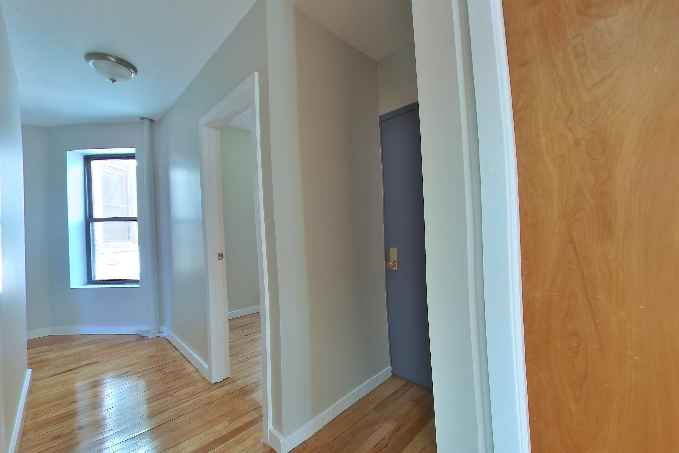 Living room, Apartment 21-22 at Metronest Leasing