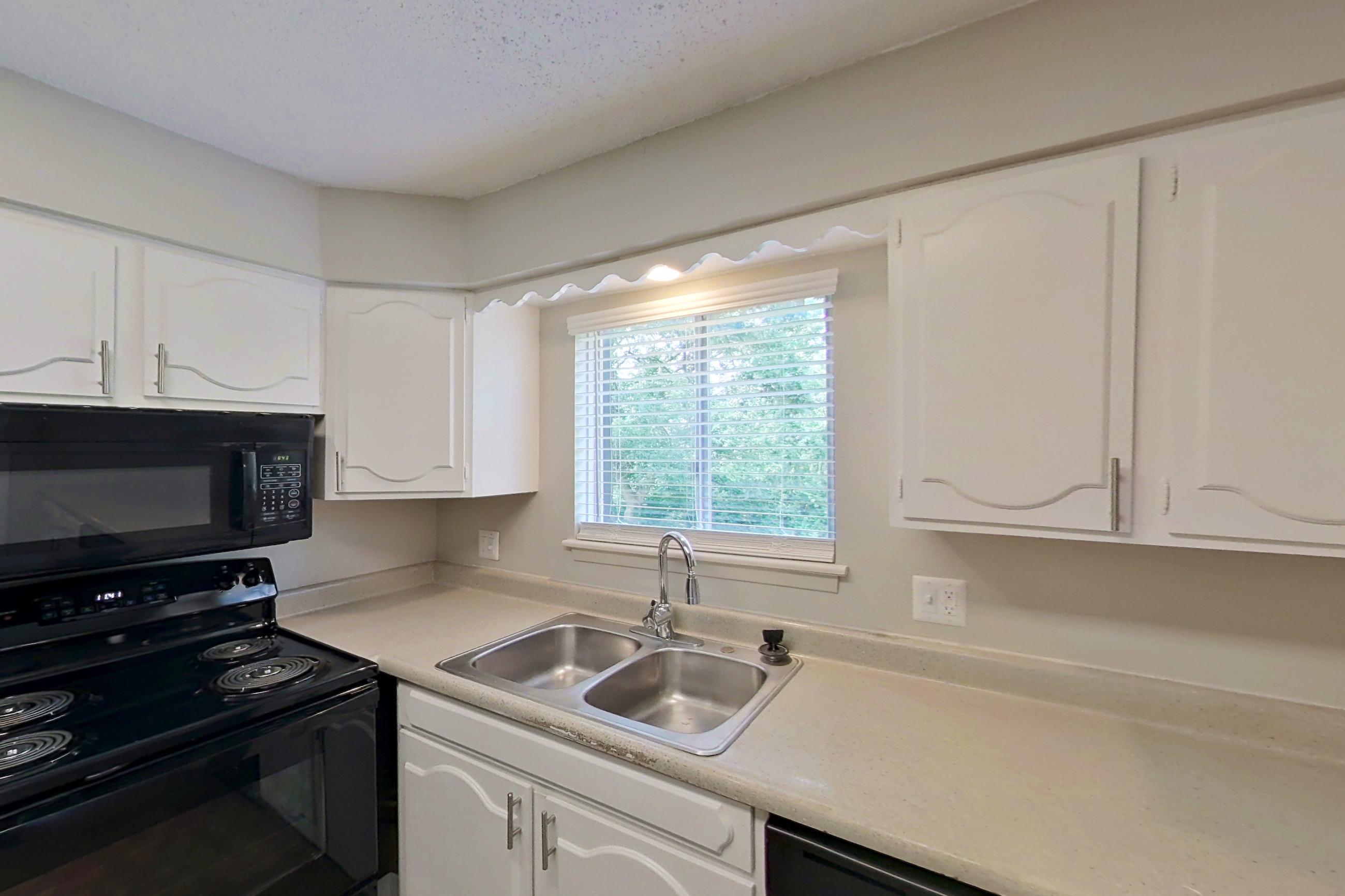 Kitchen in a 2x1 B Elite floor plan apartment, representative of Apartment 9610D at The Life at Legacy Fountains