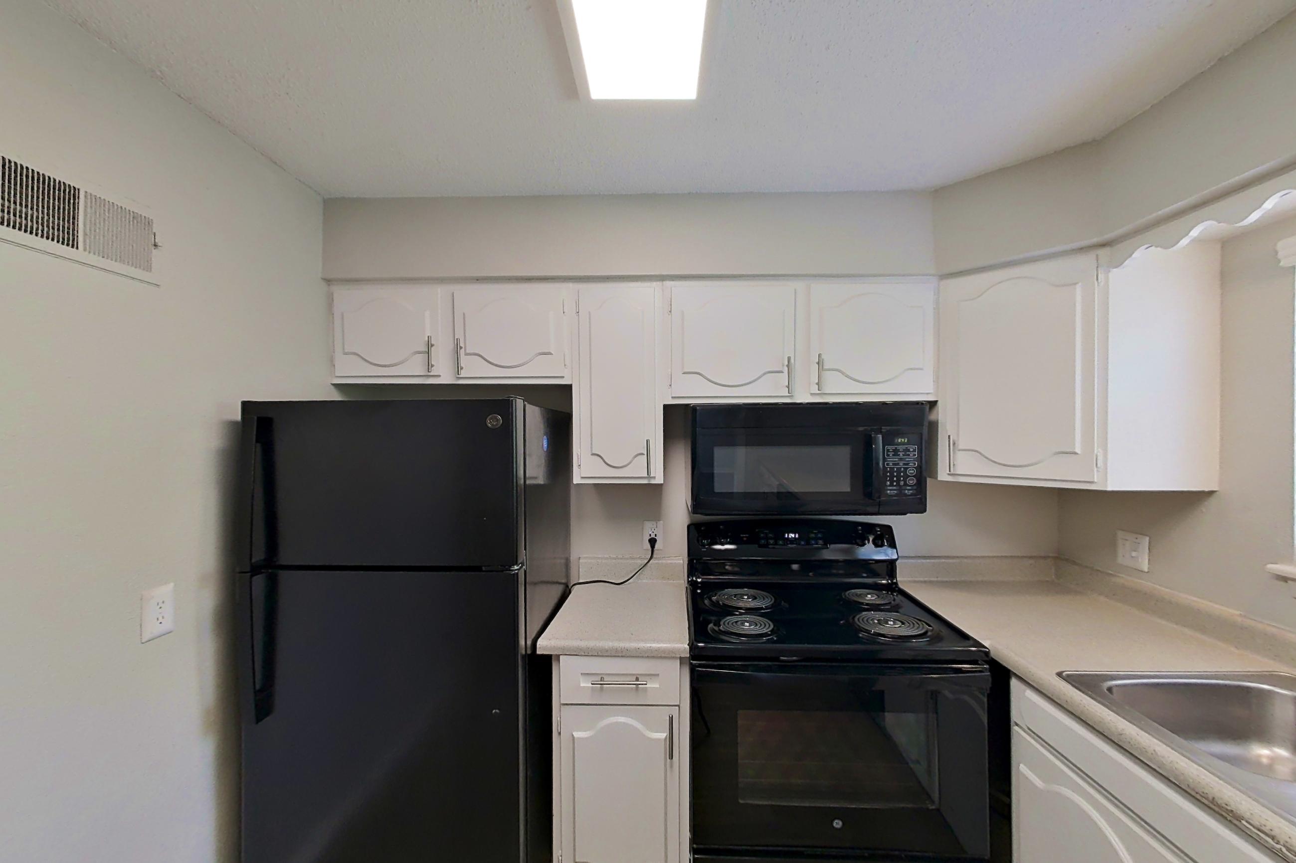 Kitchen in a 2x1 B Elite floor plan apartment, representative of Apartment 9610D at The Life at Legacy Fountains
