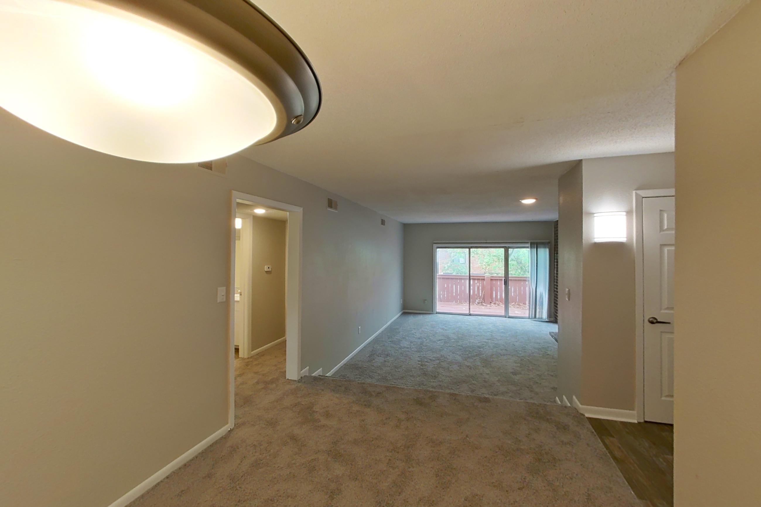 Living room, Apartment 1406C at The Life at Legacy Fountains