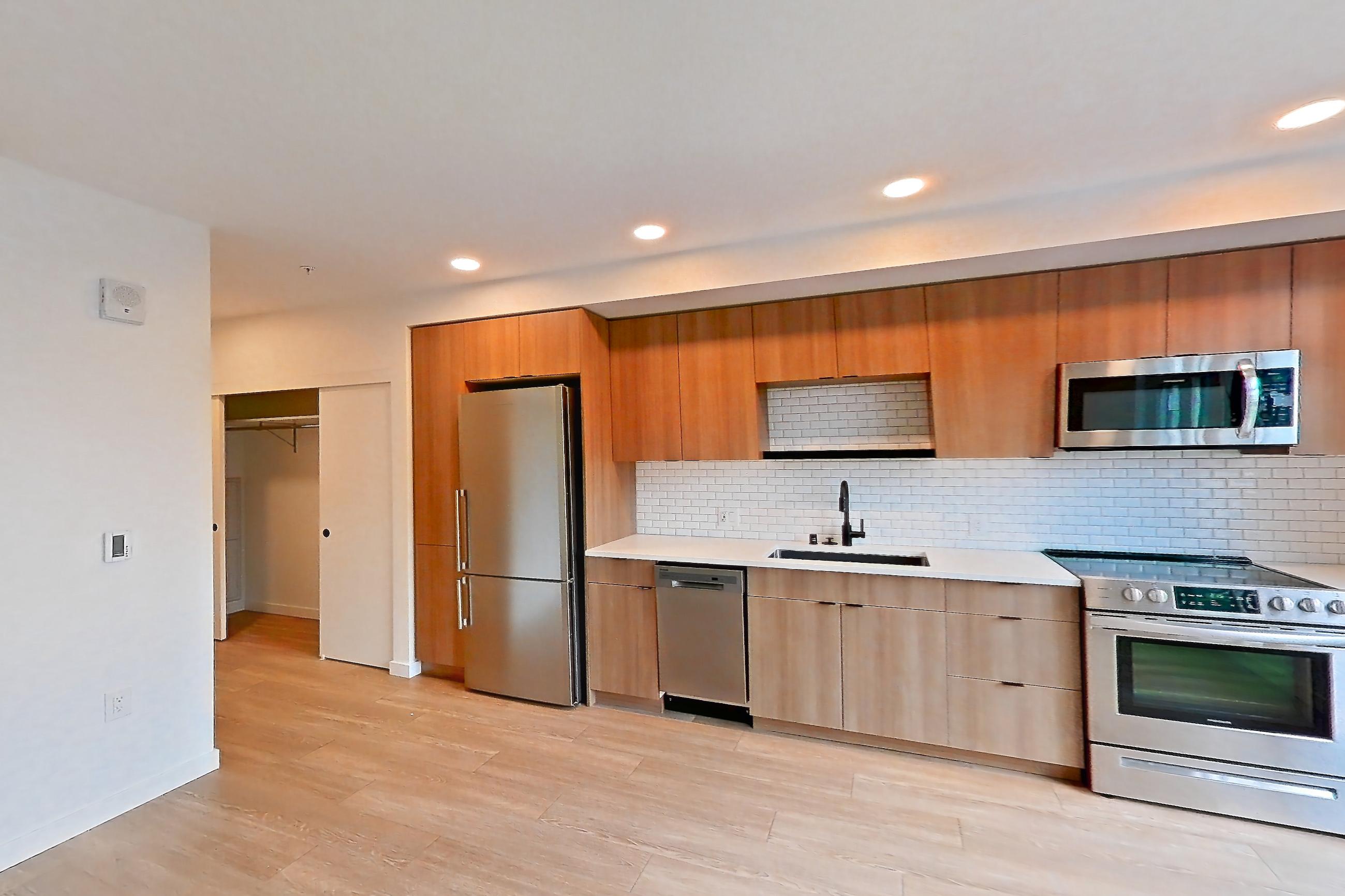 Living room in Apartment 525 at Ballard Yards, A5B floor plan