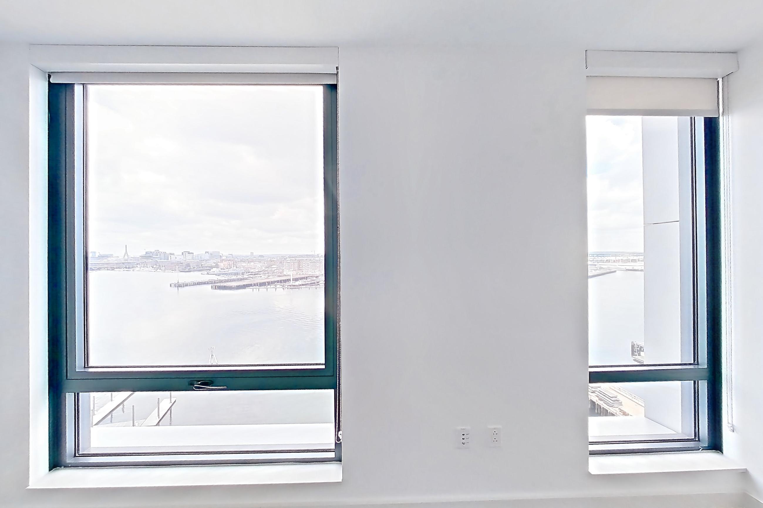 Living space with dark wood-finish flooring, Apartment 1316 at The Eddy