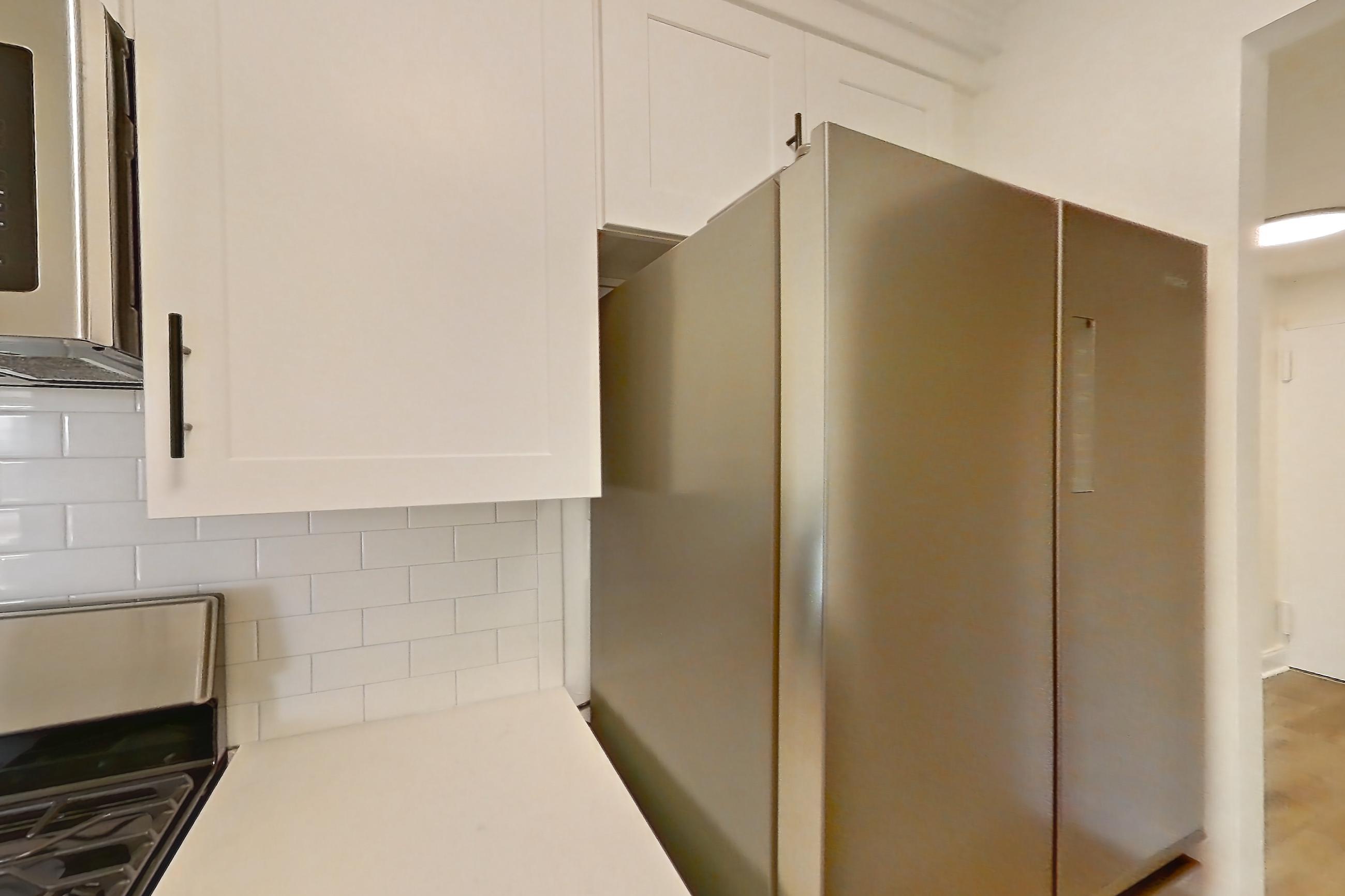 Kitchen in Apartment 10-17b at Waterside Plaza, 1L floor plan