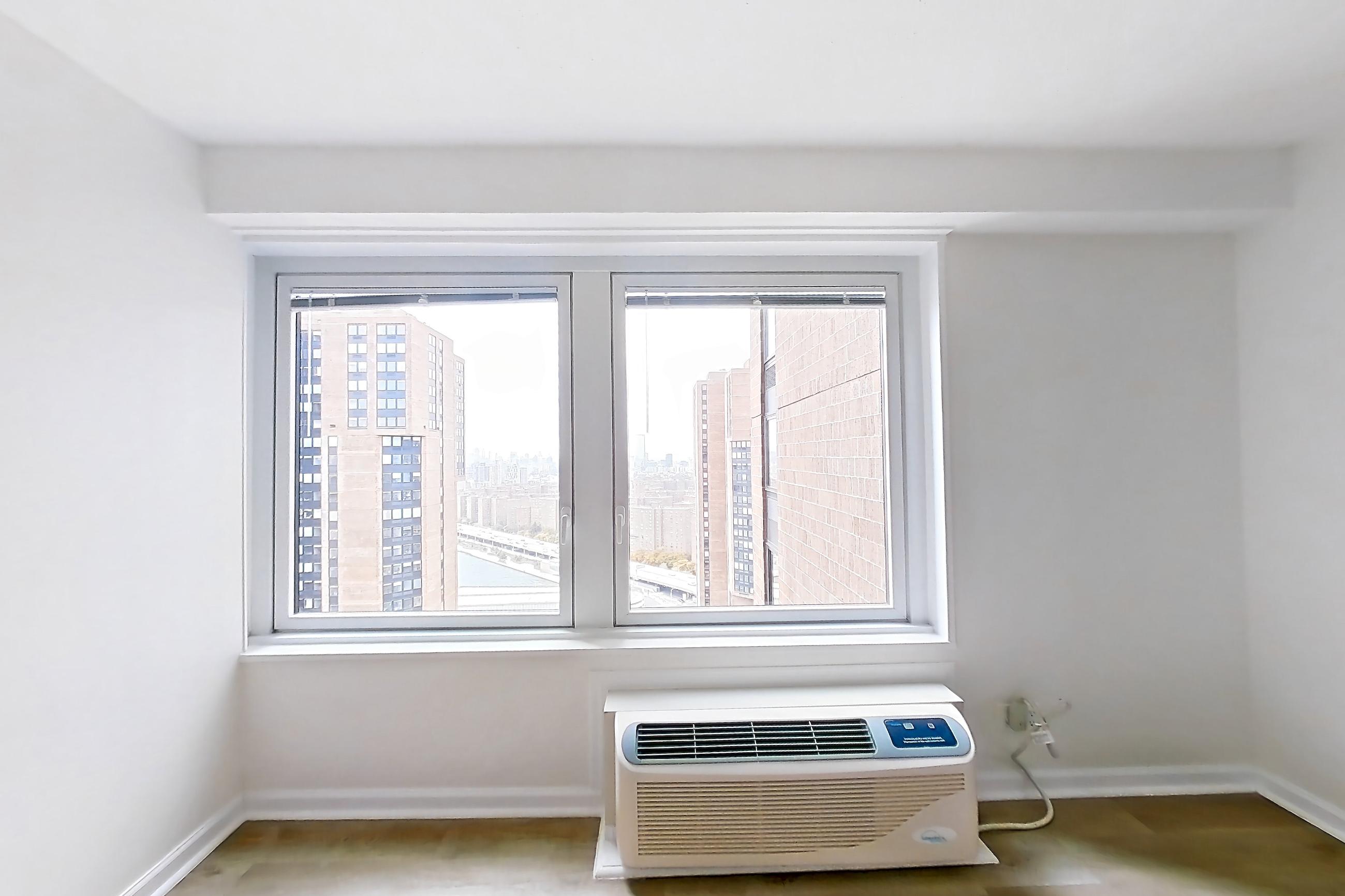 Living room in Apartment 30-30c at Waterside Plaza, 0B floor plan