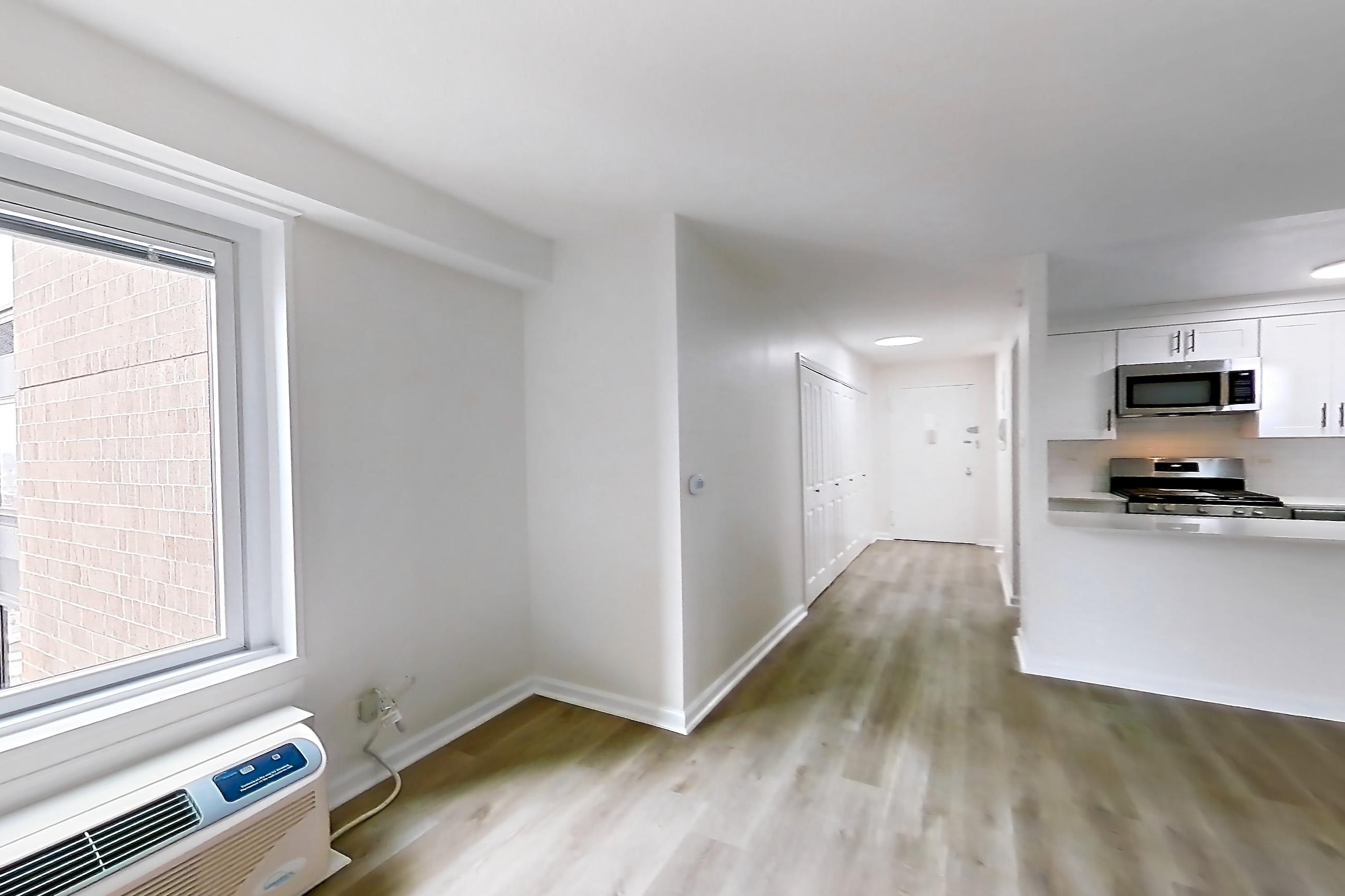 Living room in Apartment 30-30c at Waterside Plaza, 0B floor plan