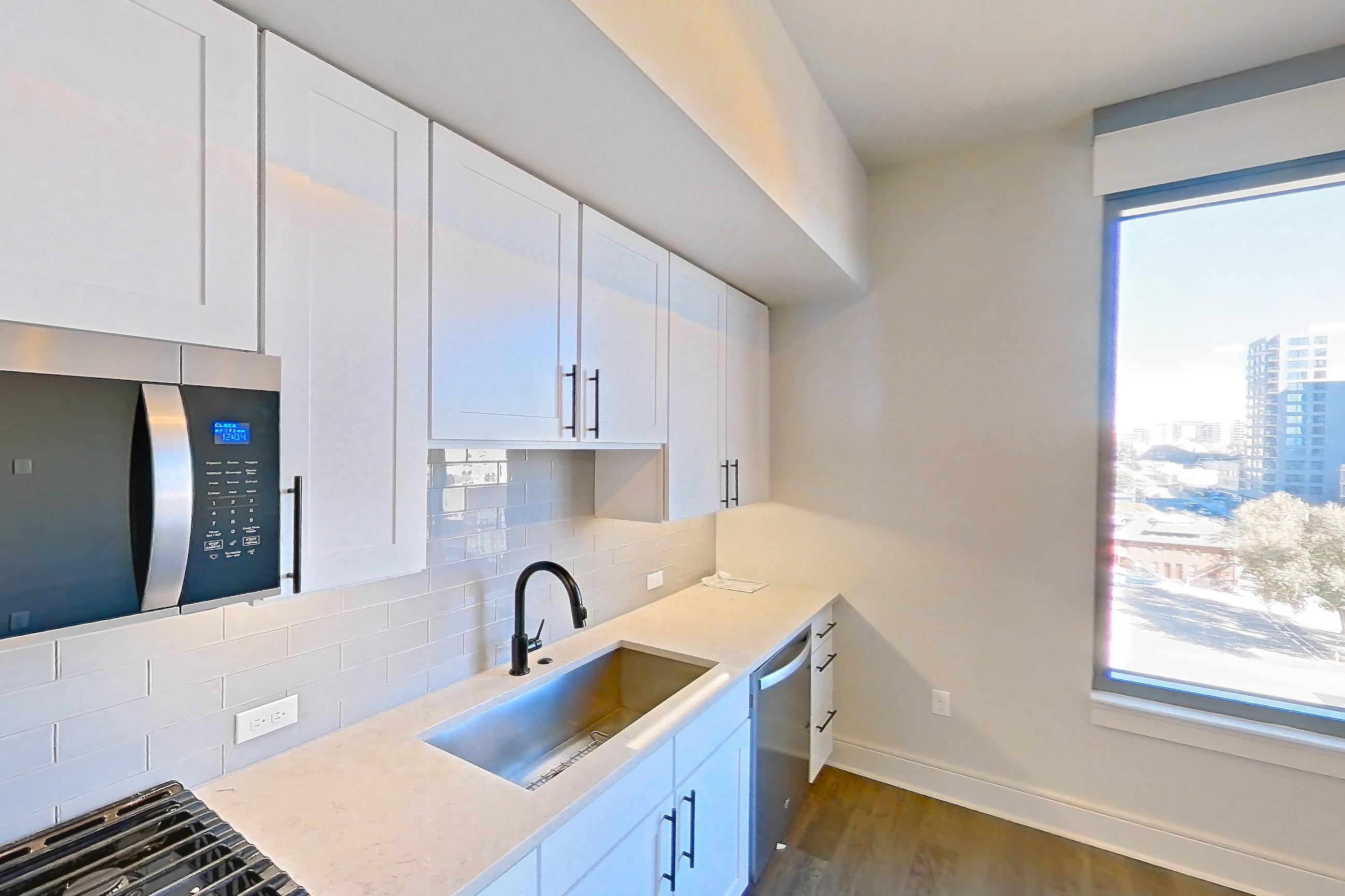 Kitchen in Apartment 718 at Parq on Speer, S1 floor plan