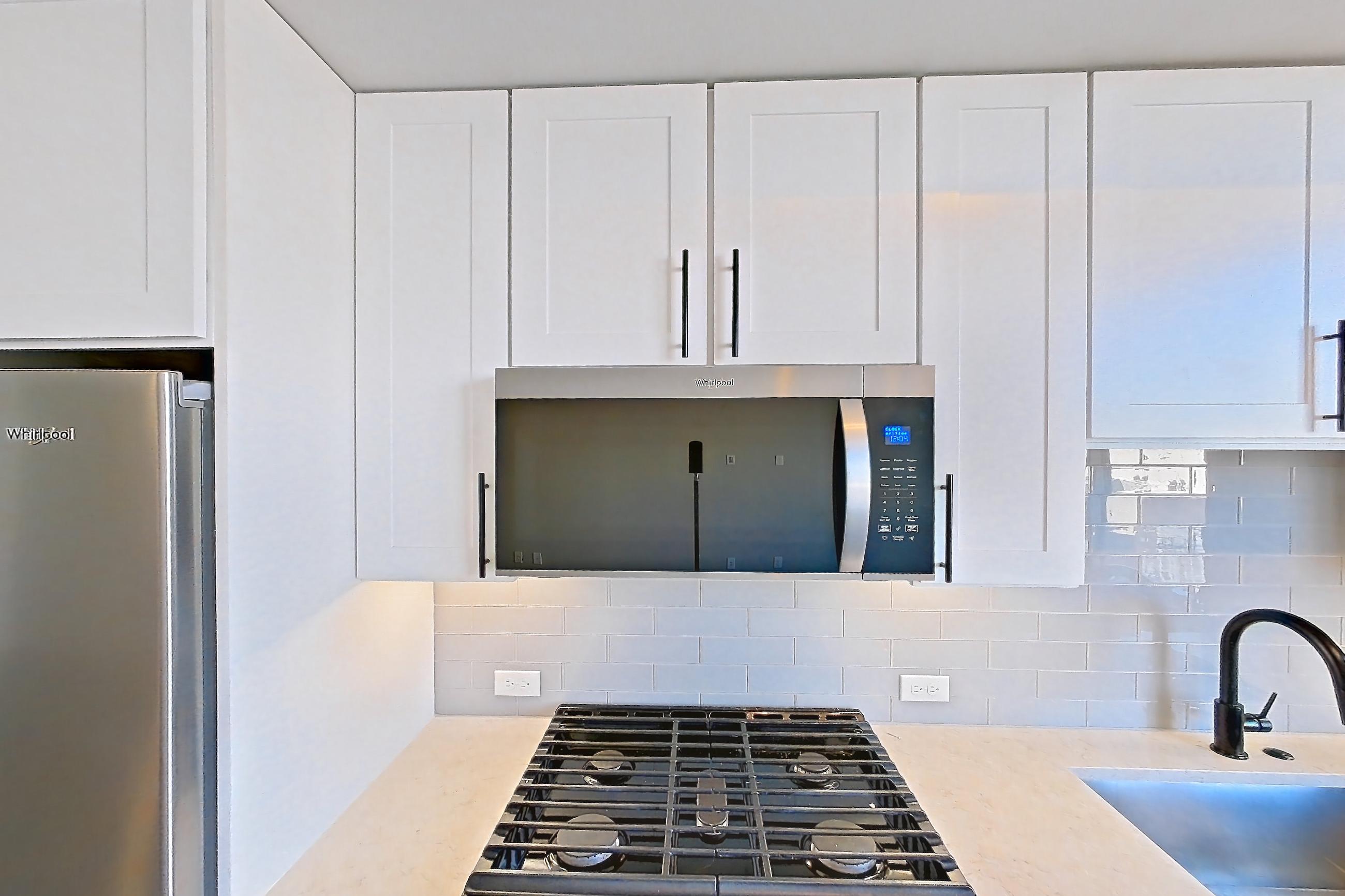 Kitchen in Apartment 718 at Parq on Speer, S1 floor plan