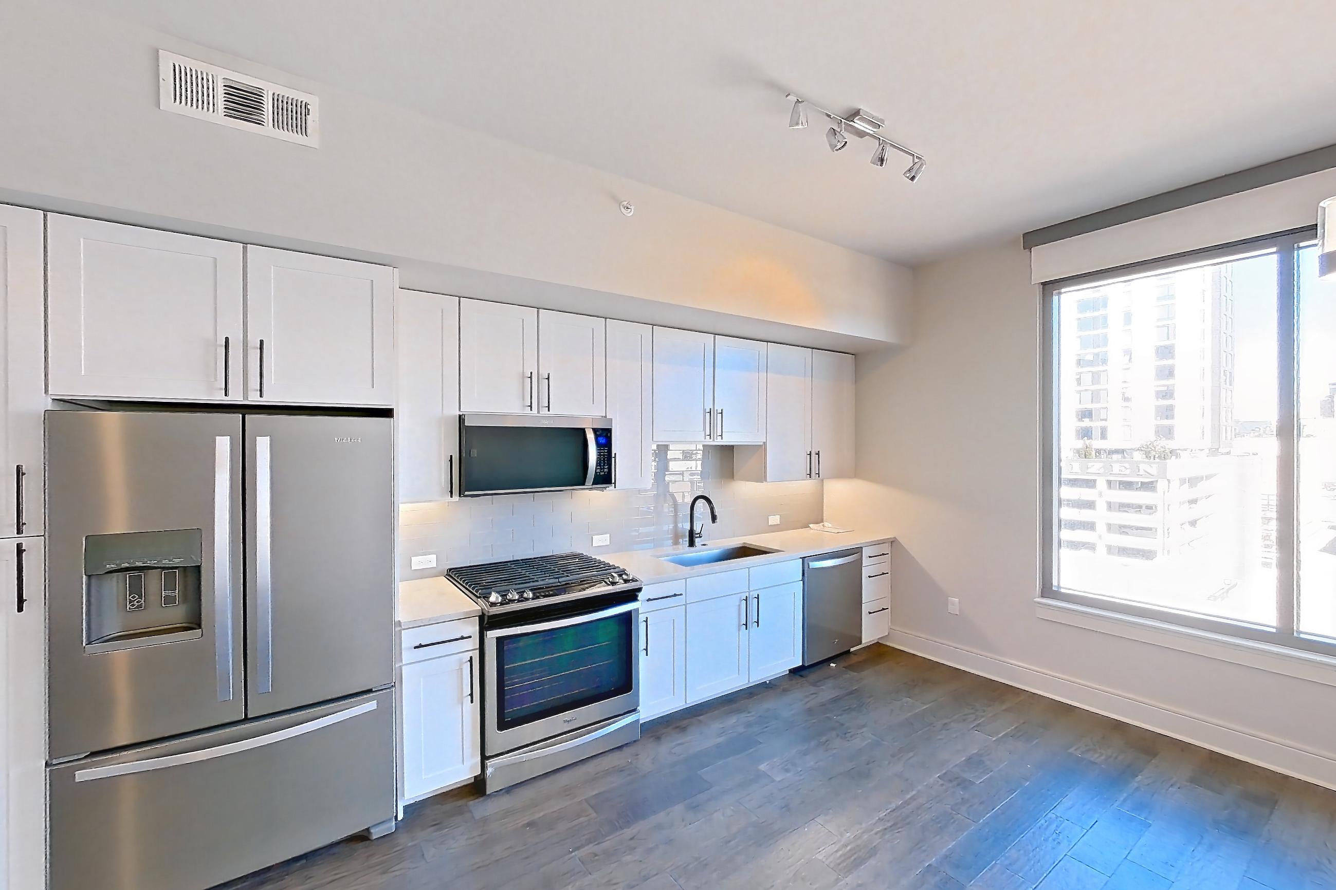 Living space in Apartment 718 at Parq on Speer, S1 floor plan