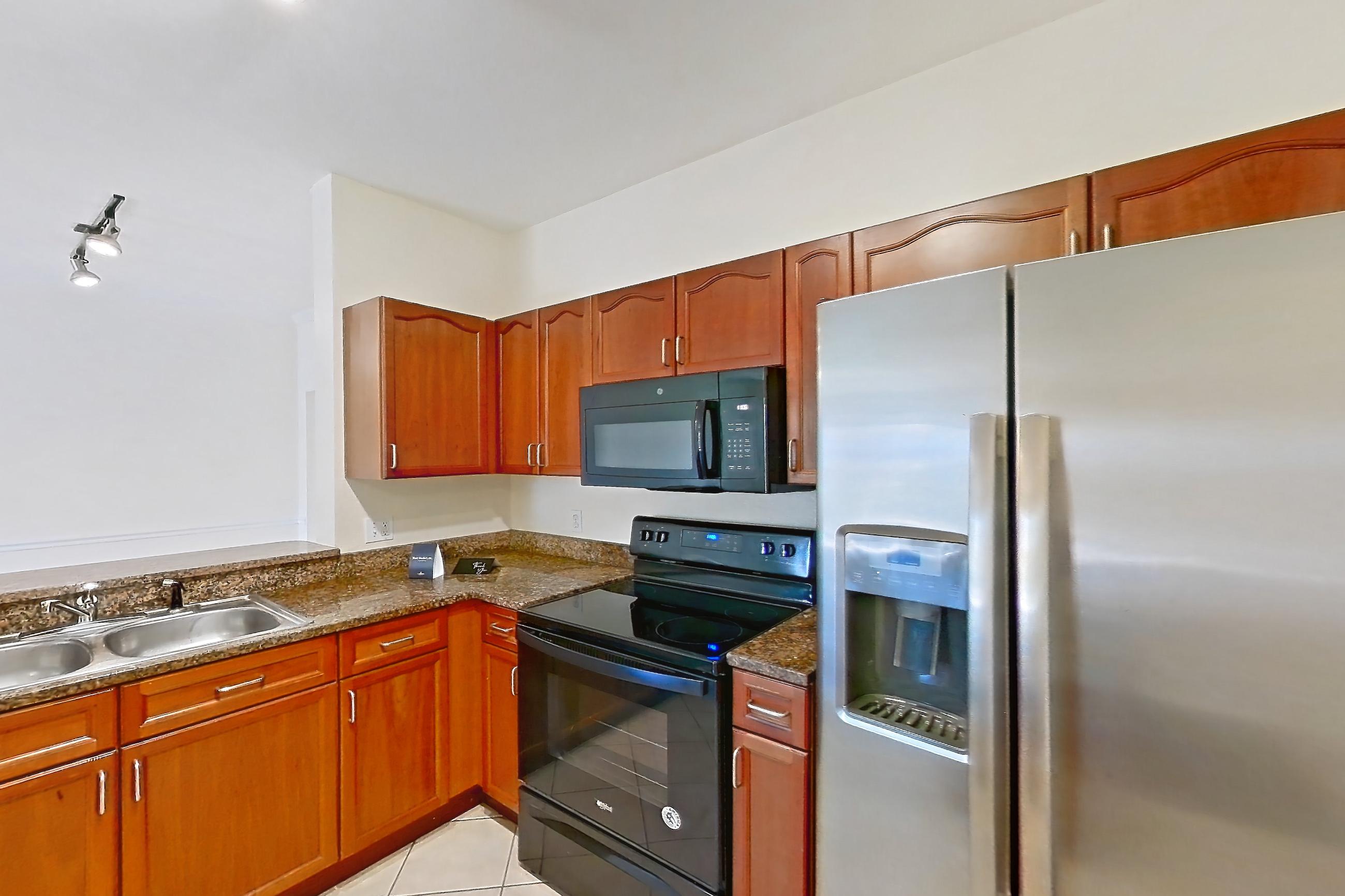 Kitchen in Apartment 106 at Tortuga Bay, B3 floor plan