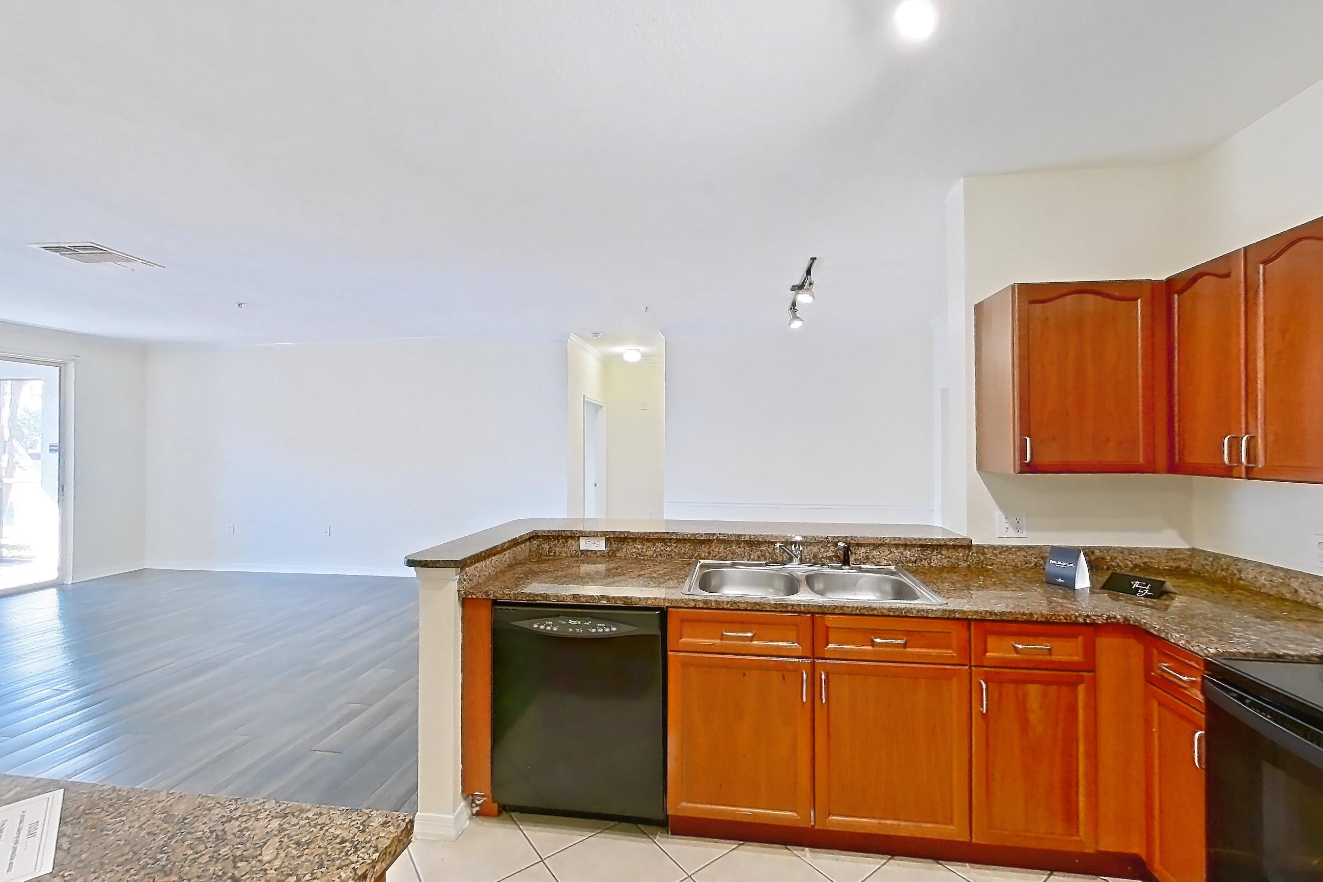 Kitchen in Apartment 106 at Tortuga Bay, B3 floor plan