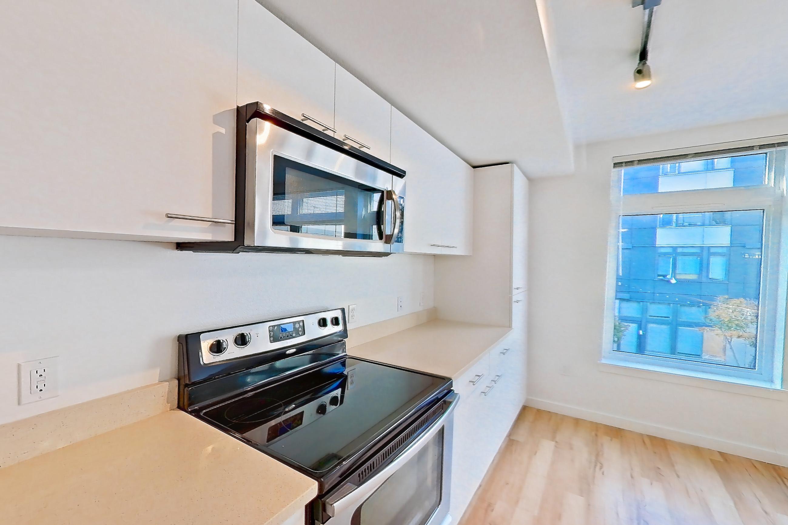 Kitchen in Apartment 0238 at Circa Greenlake, Open 1 Bedroom 1 Bath A22.1 floor plan