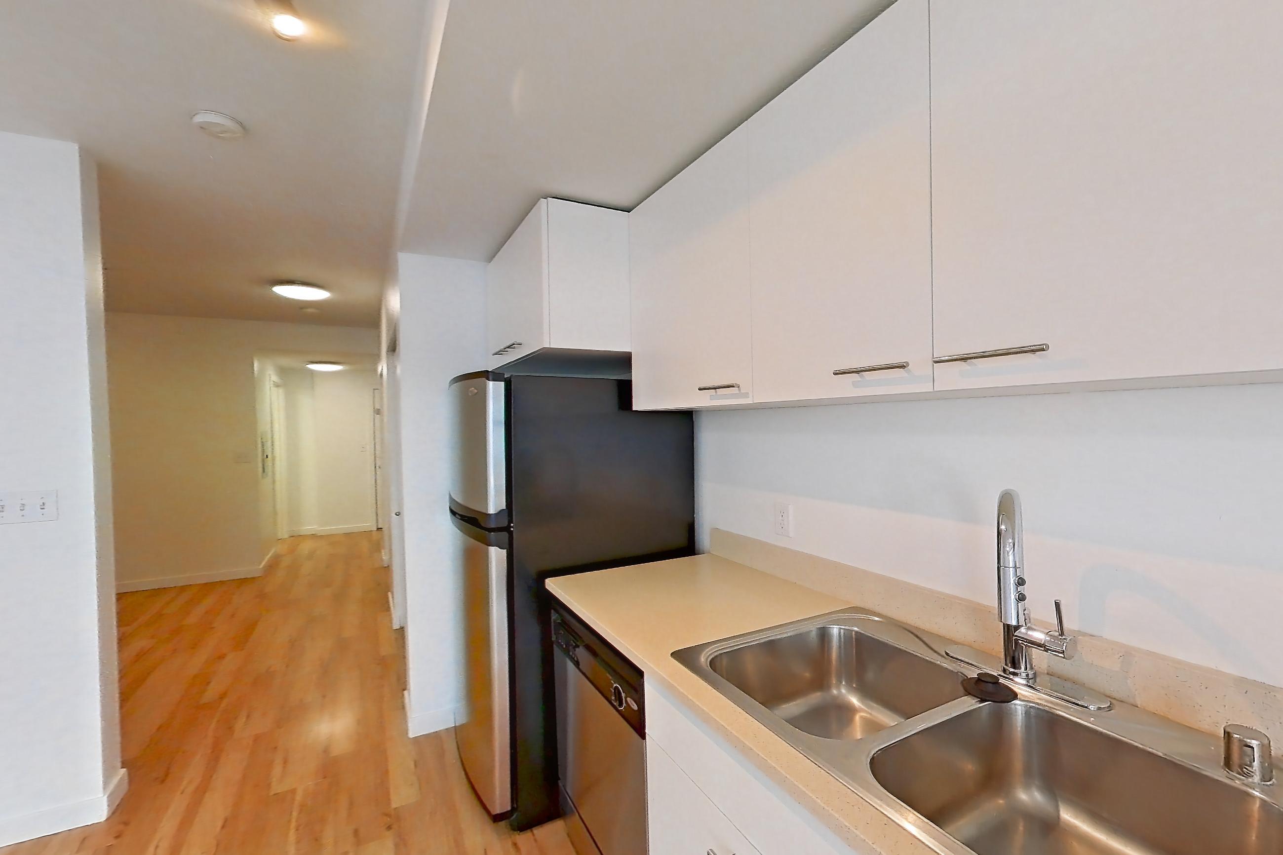 Kitchen in Apartment 0238 at Circa Greenlake, Open 1 Bedroom 1 Bath A22.1 floor plan