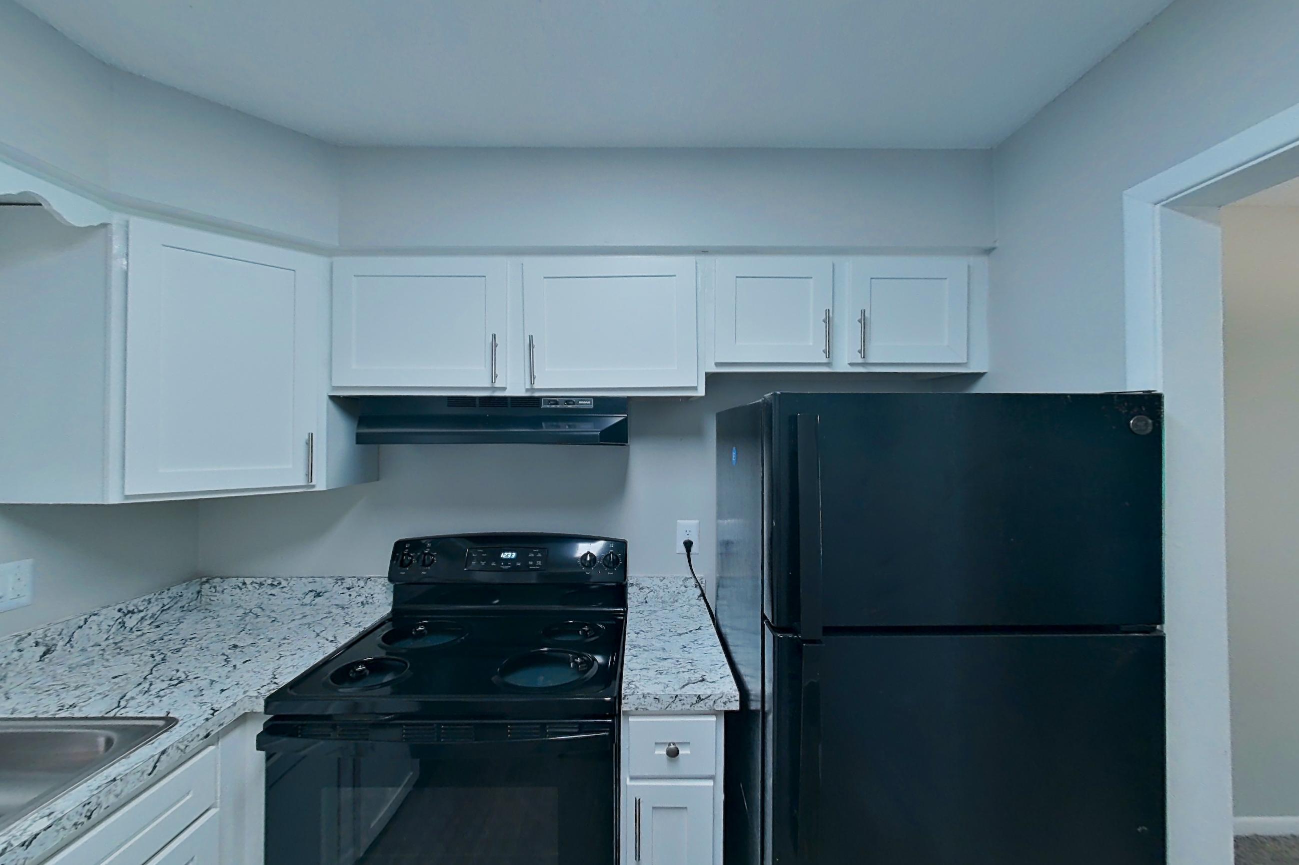 Kitchen in a 1x1 B Elite floor plan apartment, representative of Apartment 9600C at The Life at Legacy Fountains