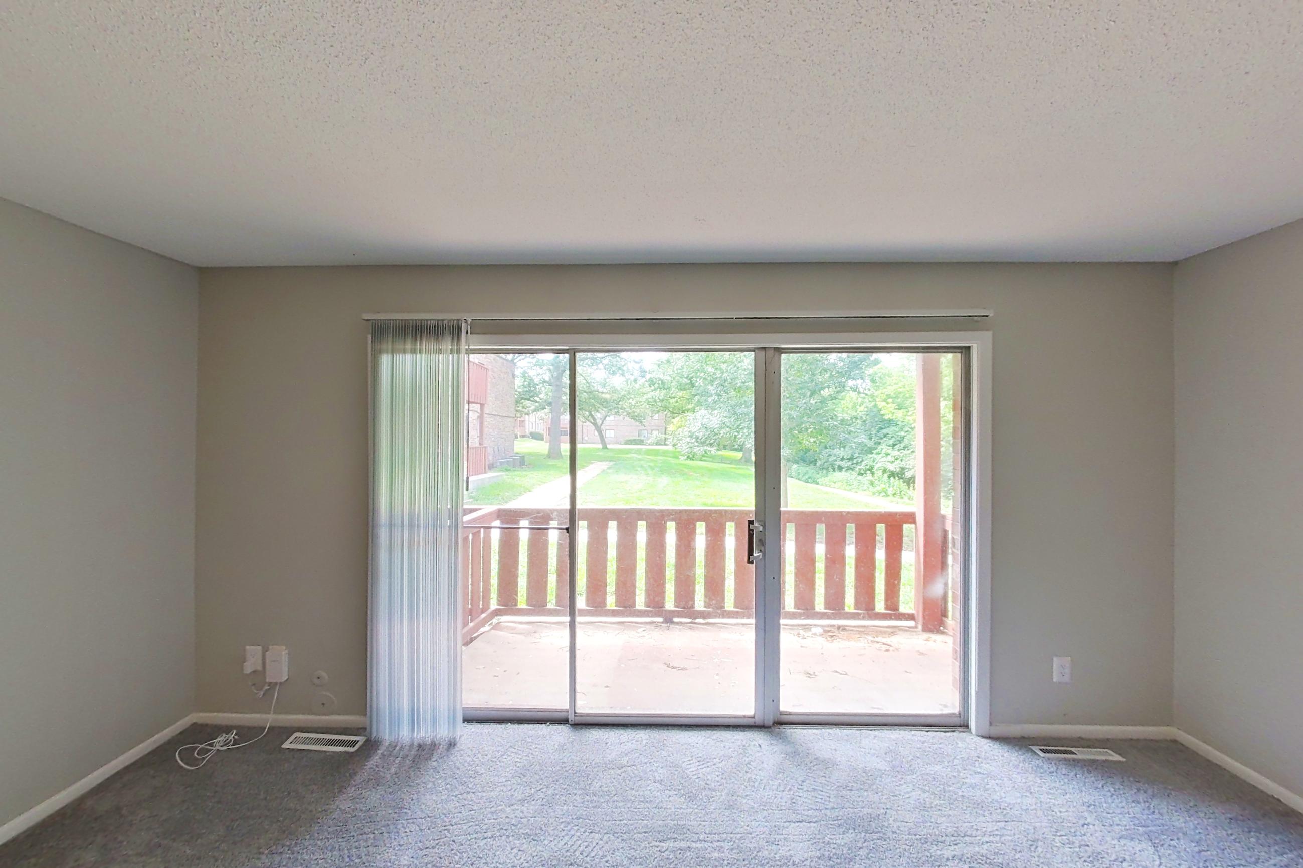 Living room, Apartment 9600A at The Life at Legacy Fountains