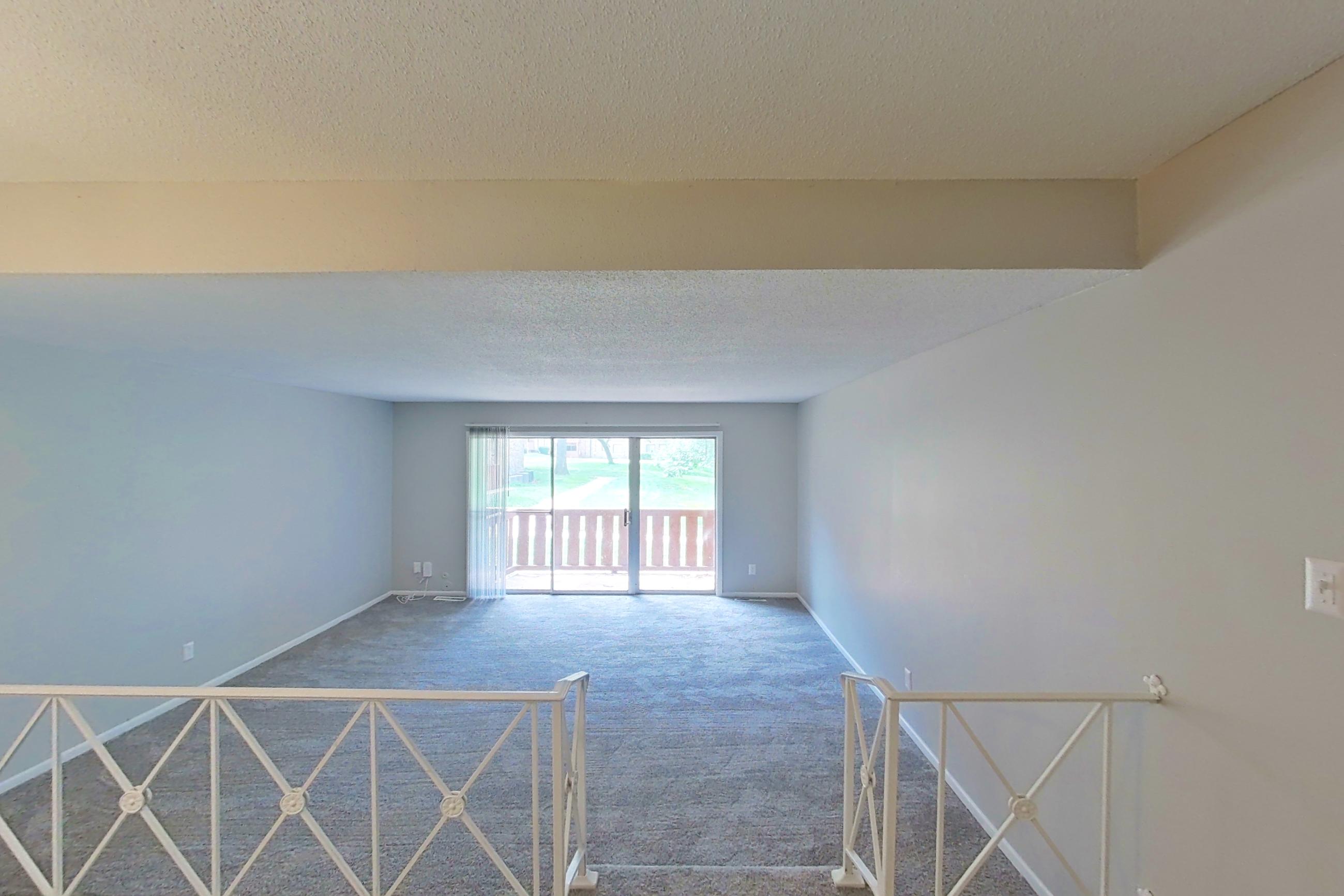 Living space with refrigerator, Apartment 9600A at The Life at Legacy Fountains