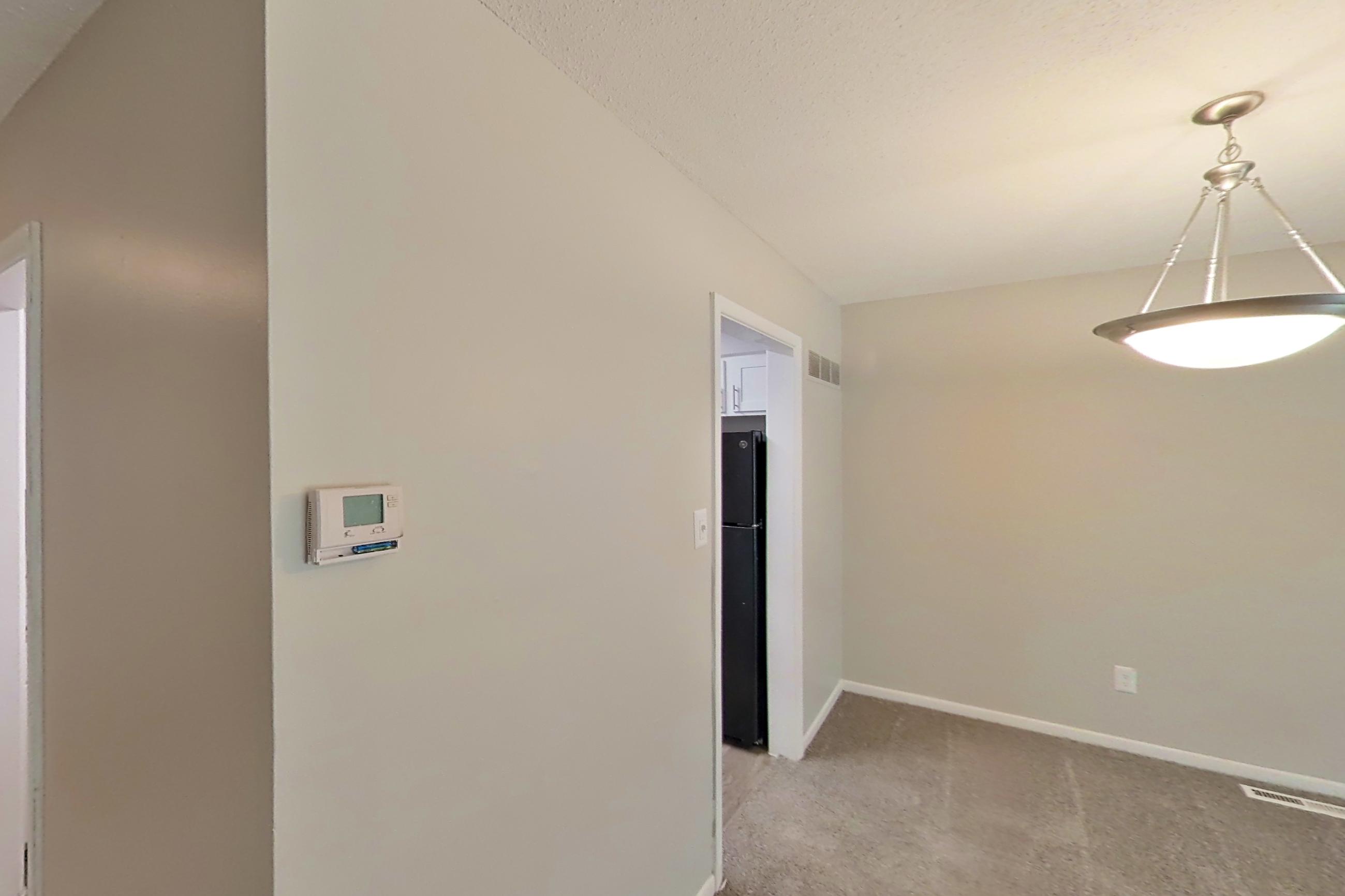 Living space in a 1x1 B Elite floor plan apartment, representative of Apartment 9600C at The Life at Legacy Fountains