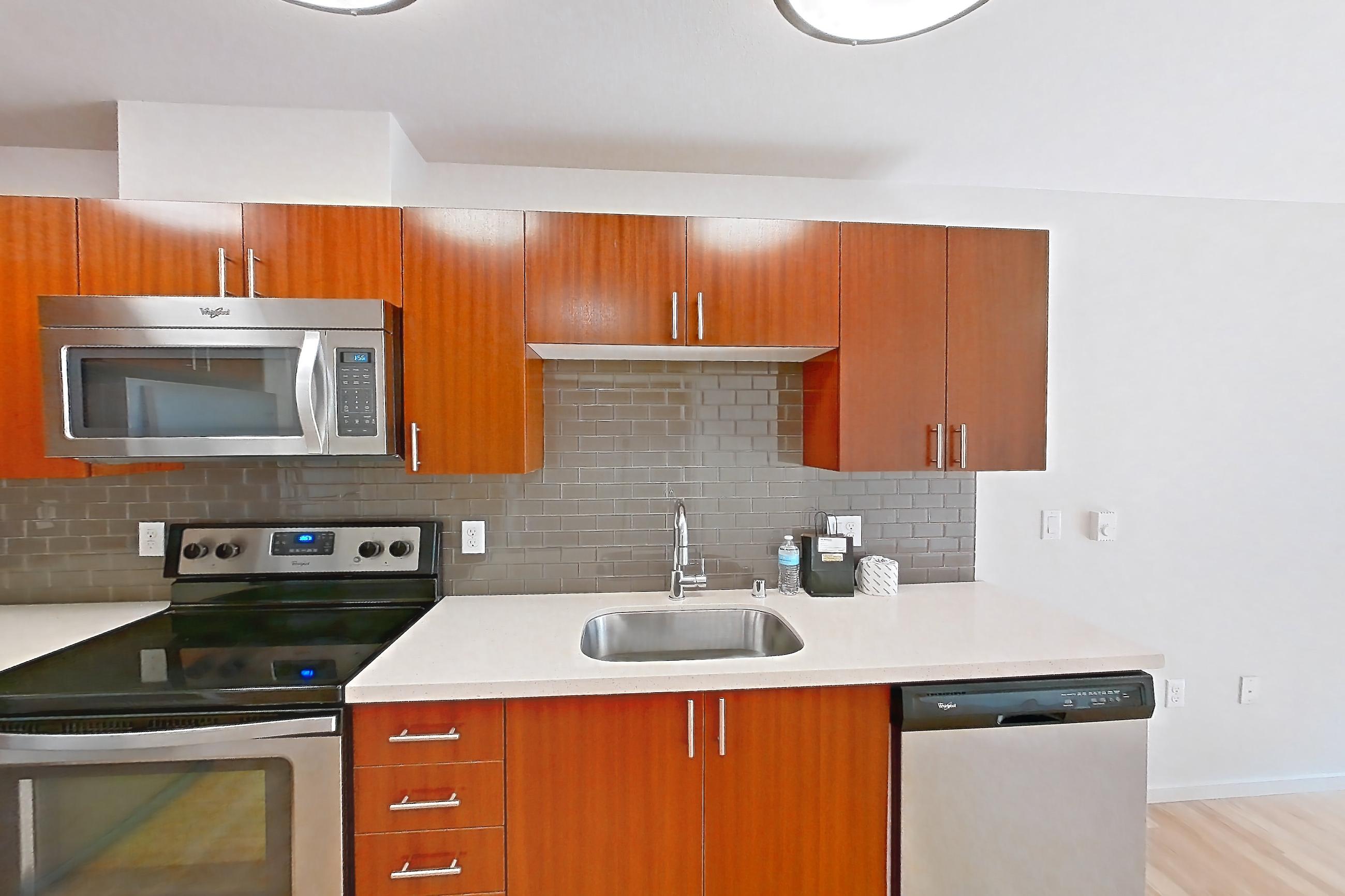 Kitchen in a Donzi Studio floor plan unit, representative of Unit L406 at Union SLU