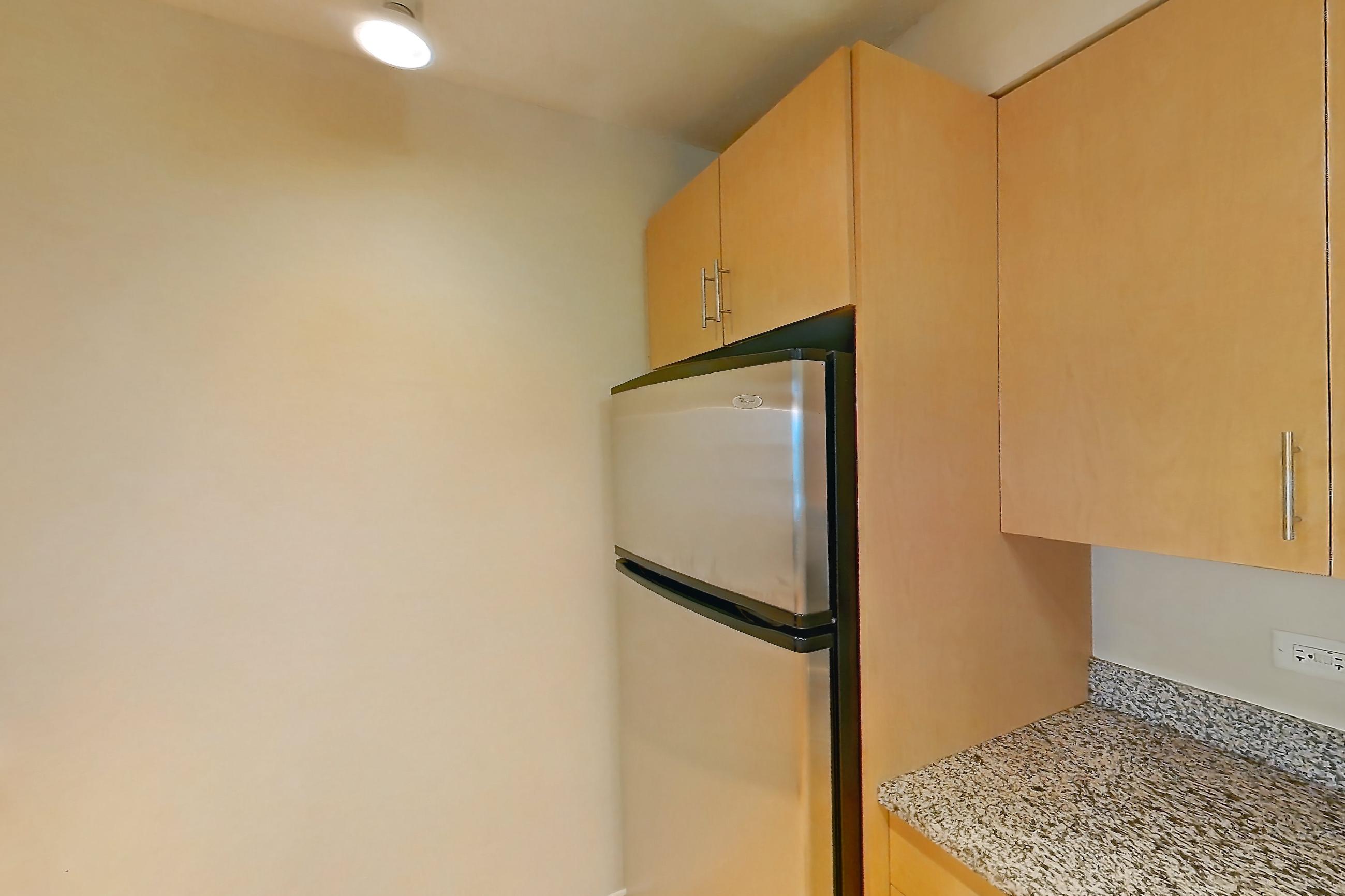 Kitchen in Apartment 00-1704 at Sky55, 1C floor plan
