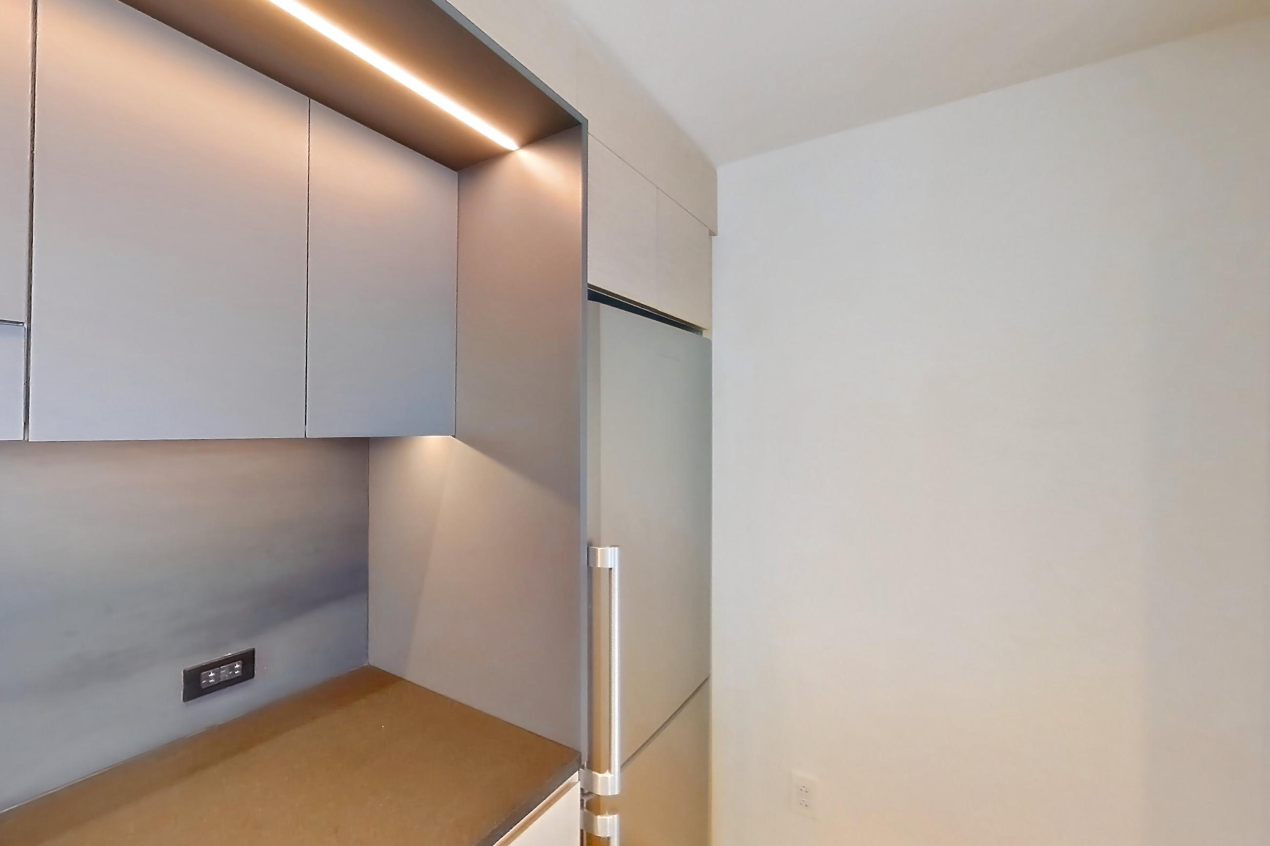 Kitchen in Apartment 1-2206 at Eagle + West, 1BG floor plan