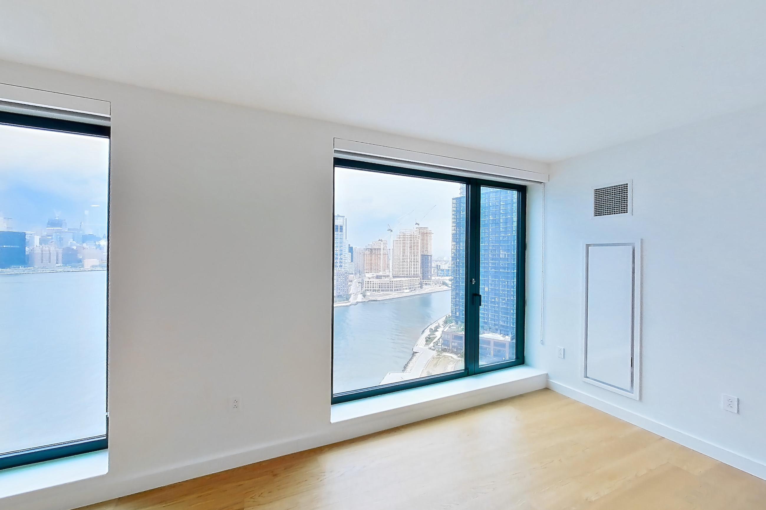Living room in Apartment 1-2206 at Eagle + West, 1BG floor plan