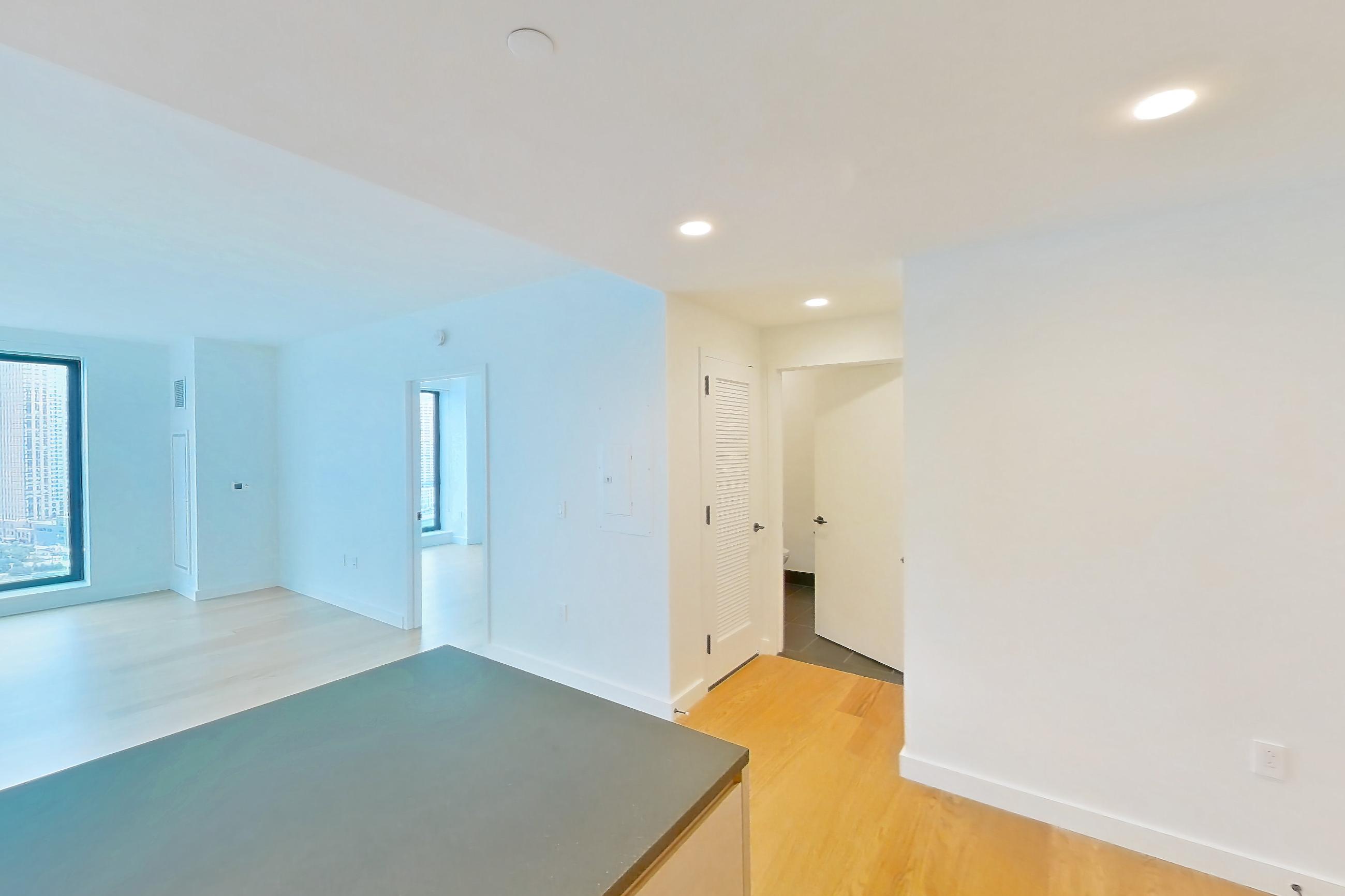 Kitchen in Apartment 1-2205 at Eagle + West, 1U floor plan