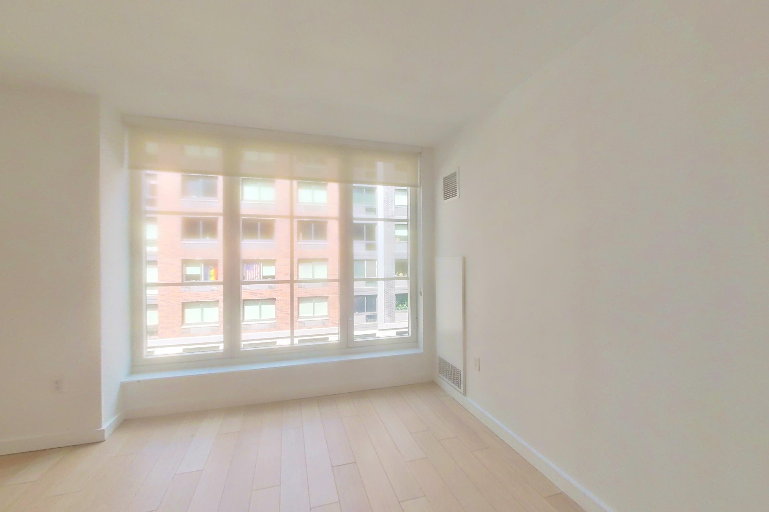 Living room with light wood-finish flooring, Apartment N-5L at 535W43