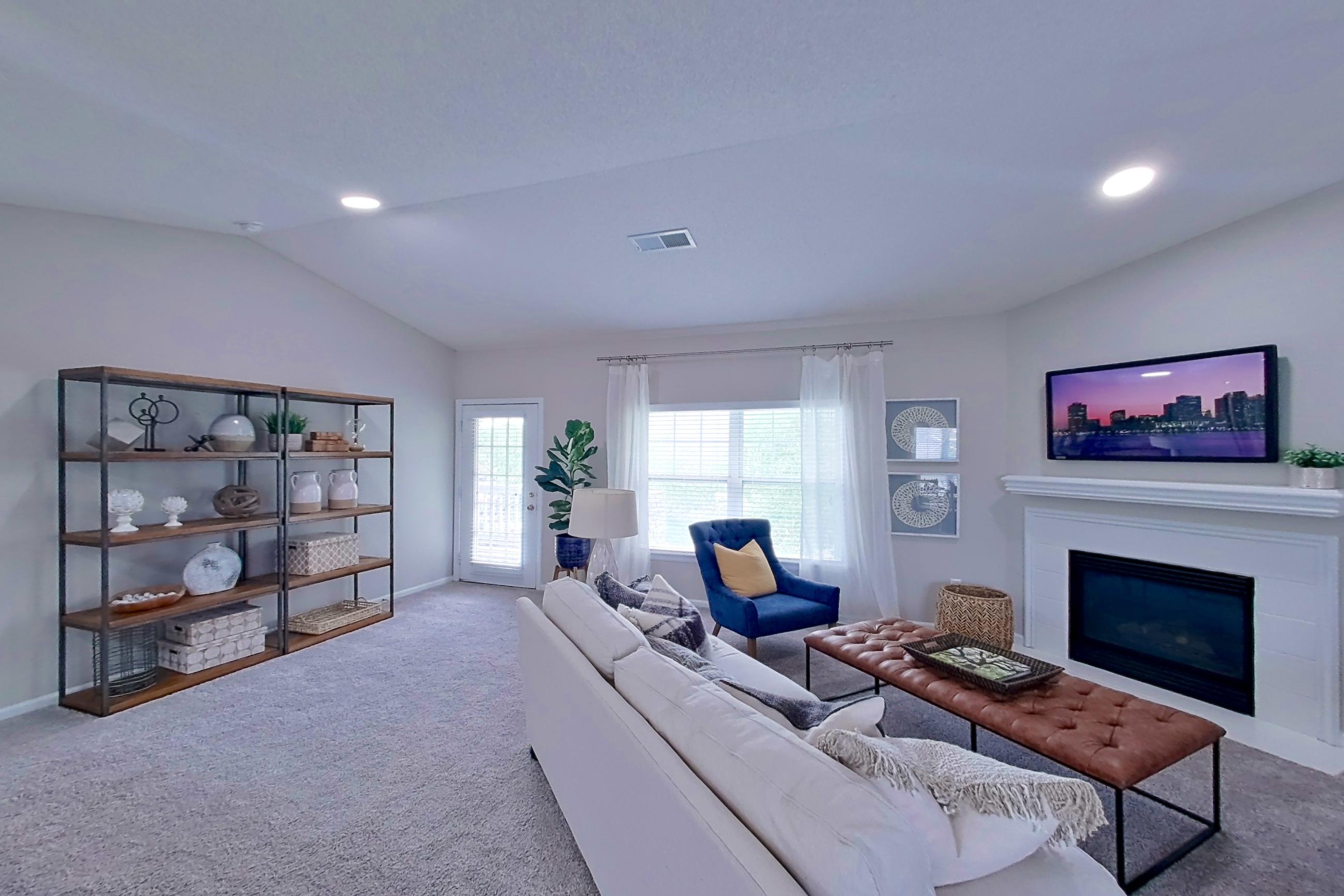 Living space with fireplace, Apartment Bradford II at Bradford Pointe