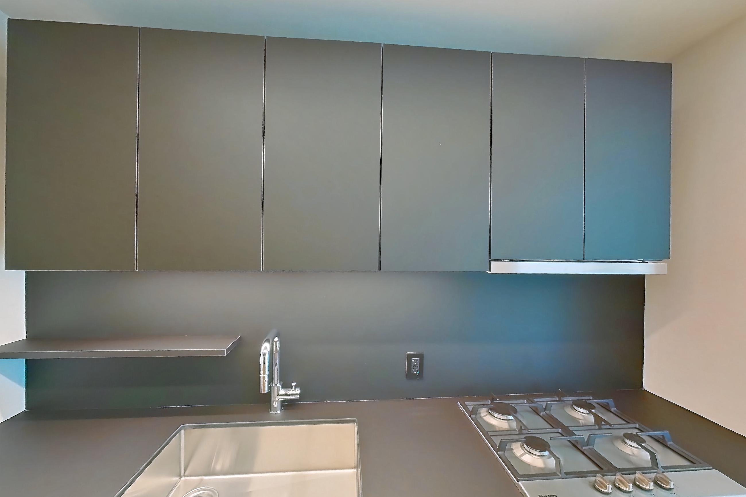 Kitchen with cooktop, gas cooktop, and stainless steel appliances, Apartment 1618 at Lincoln at Bankside