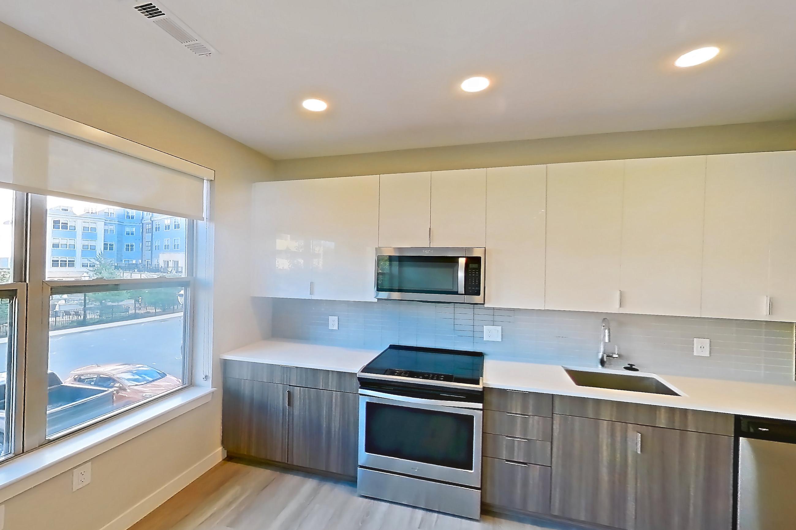Living room in Apartment em-7206 at The Emery at Overlook Ridge, S2 floor plan