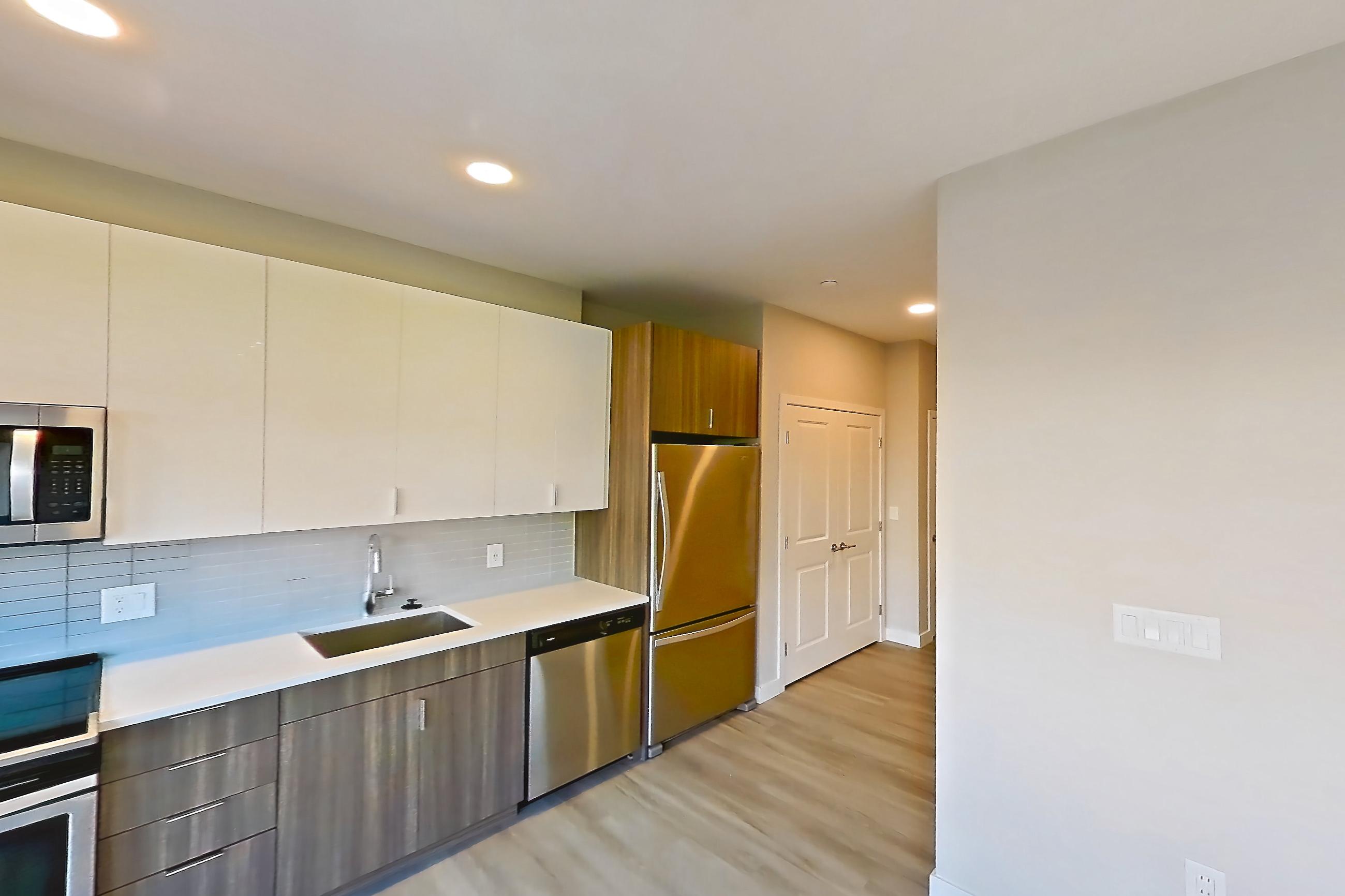 Living room in Apartment em-7206 at The Emery at Overlook Ridge, S2 floor plan