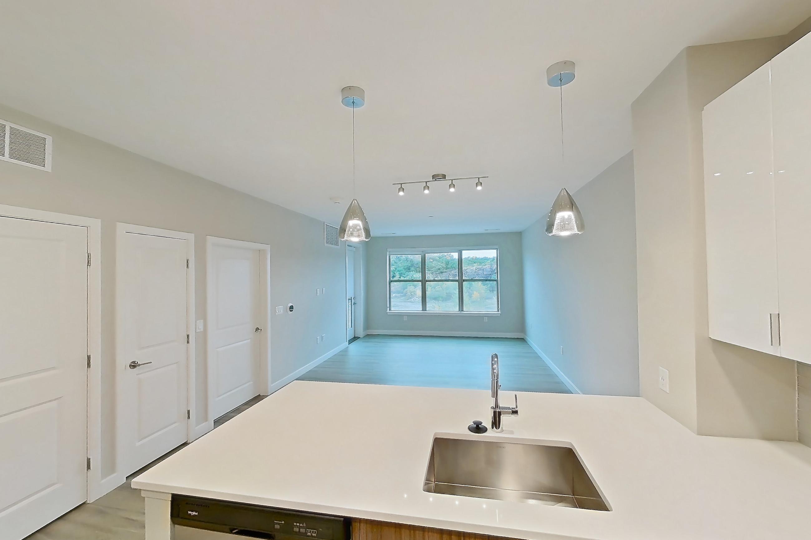 Kitchen in Apartment em-7413 at The Emery at Overlook Ridge, A5 floor plan